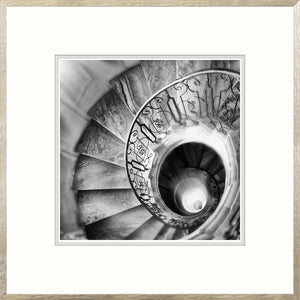 Spiral Stair I wall art featuring a black and white spiral staircase with ornate railing.