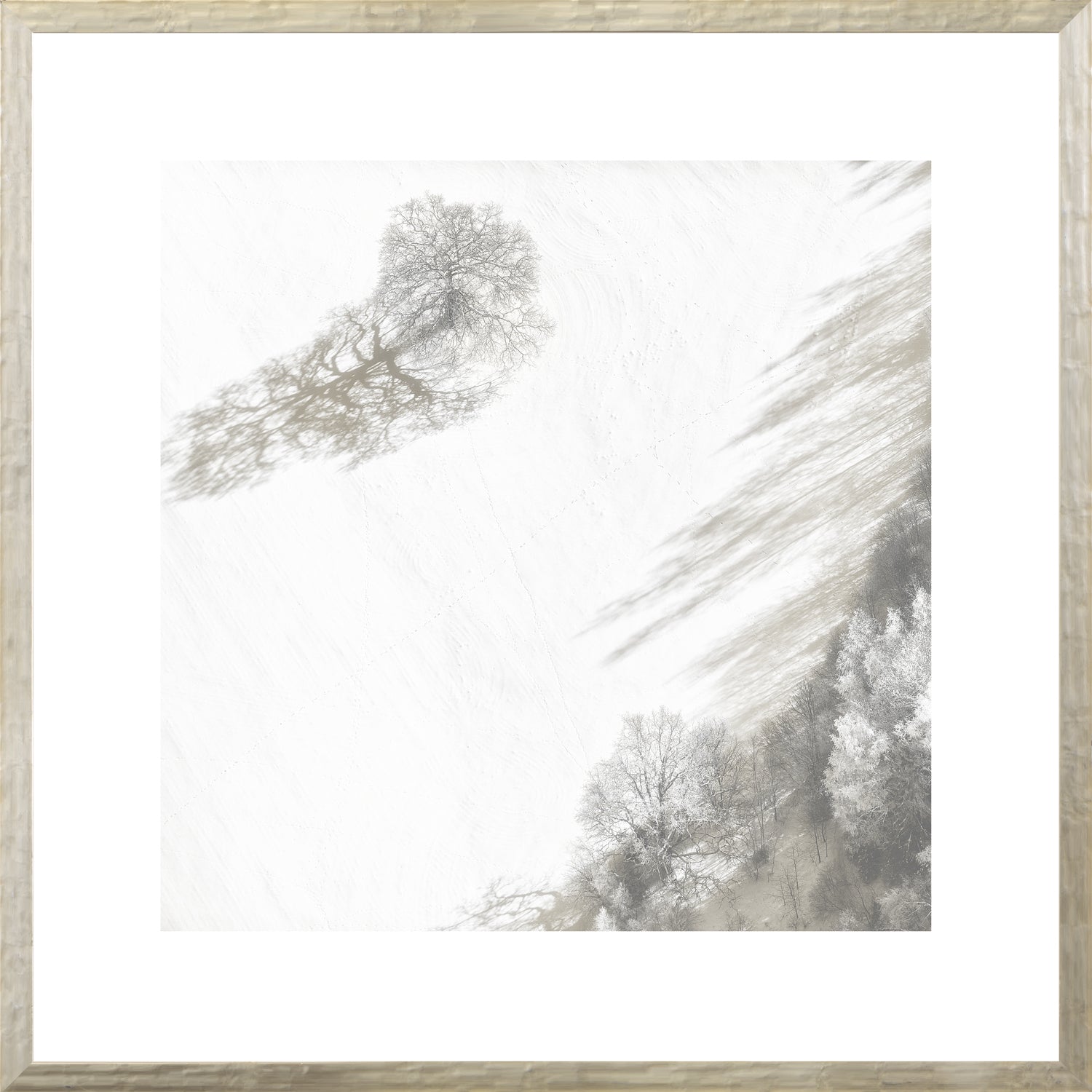 Aerial – Rural View VI wall art featuring a snowy landscape with trees and shadows.