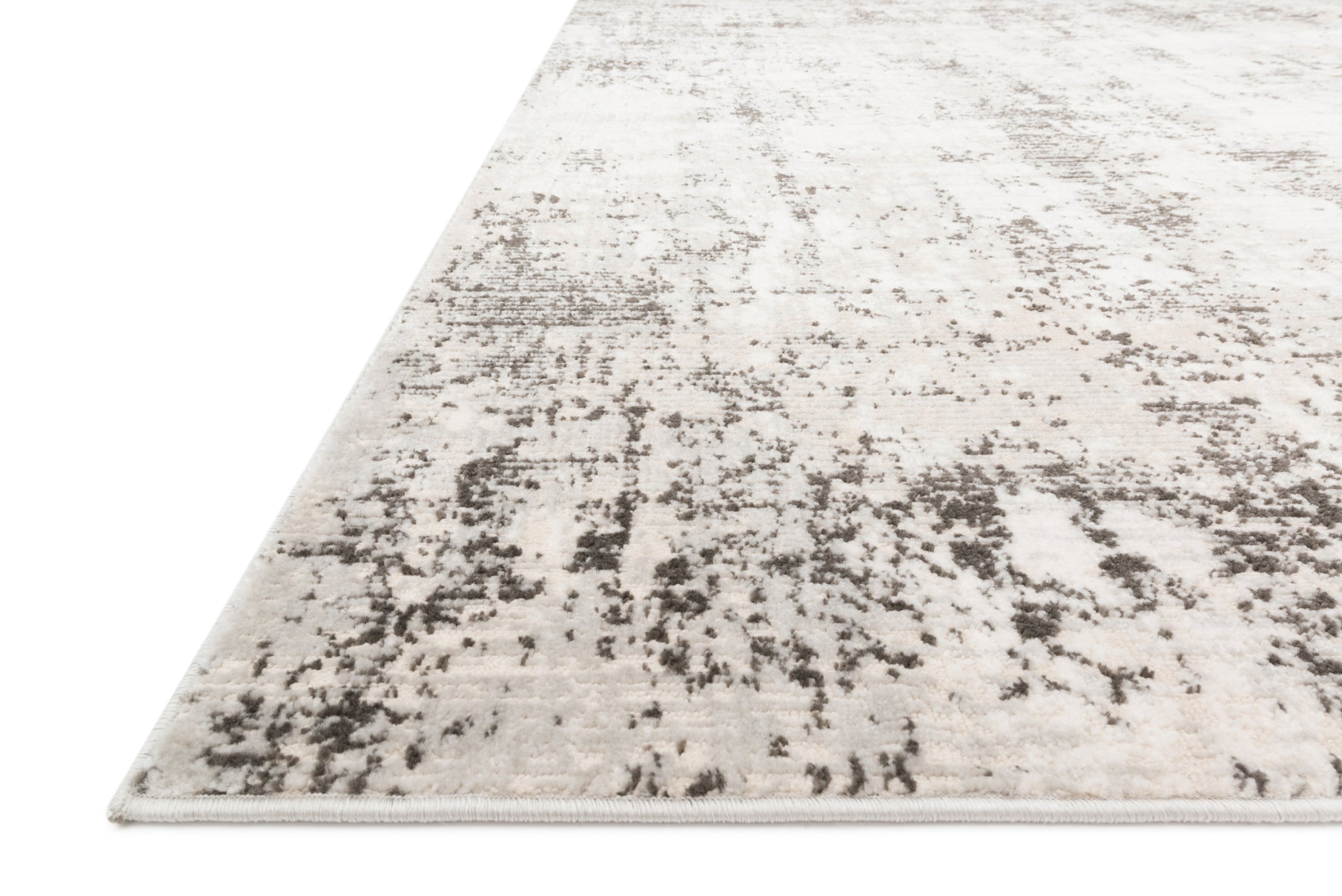 side view of Alchemy Silver / Graphite luxury Rug