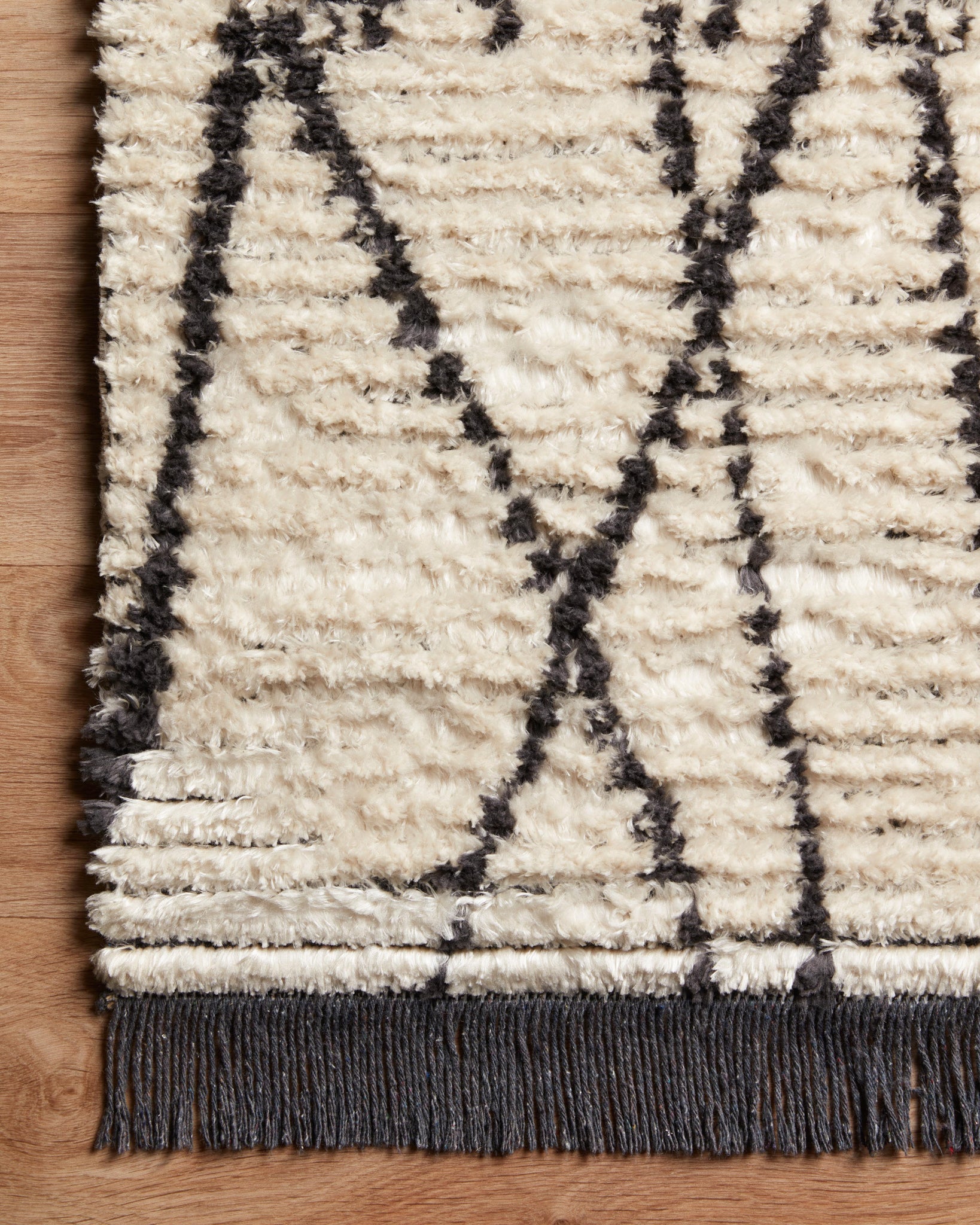 lifestyle view of Alice Cream / Charcoal by Chris Loves Julia x Loloi luxury Rug