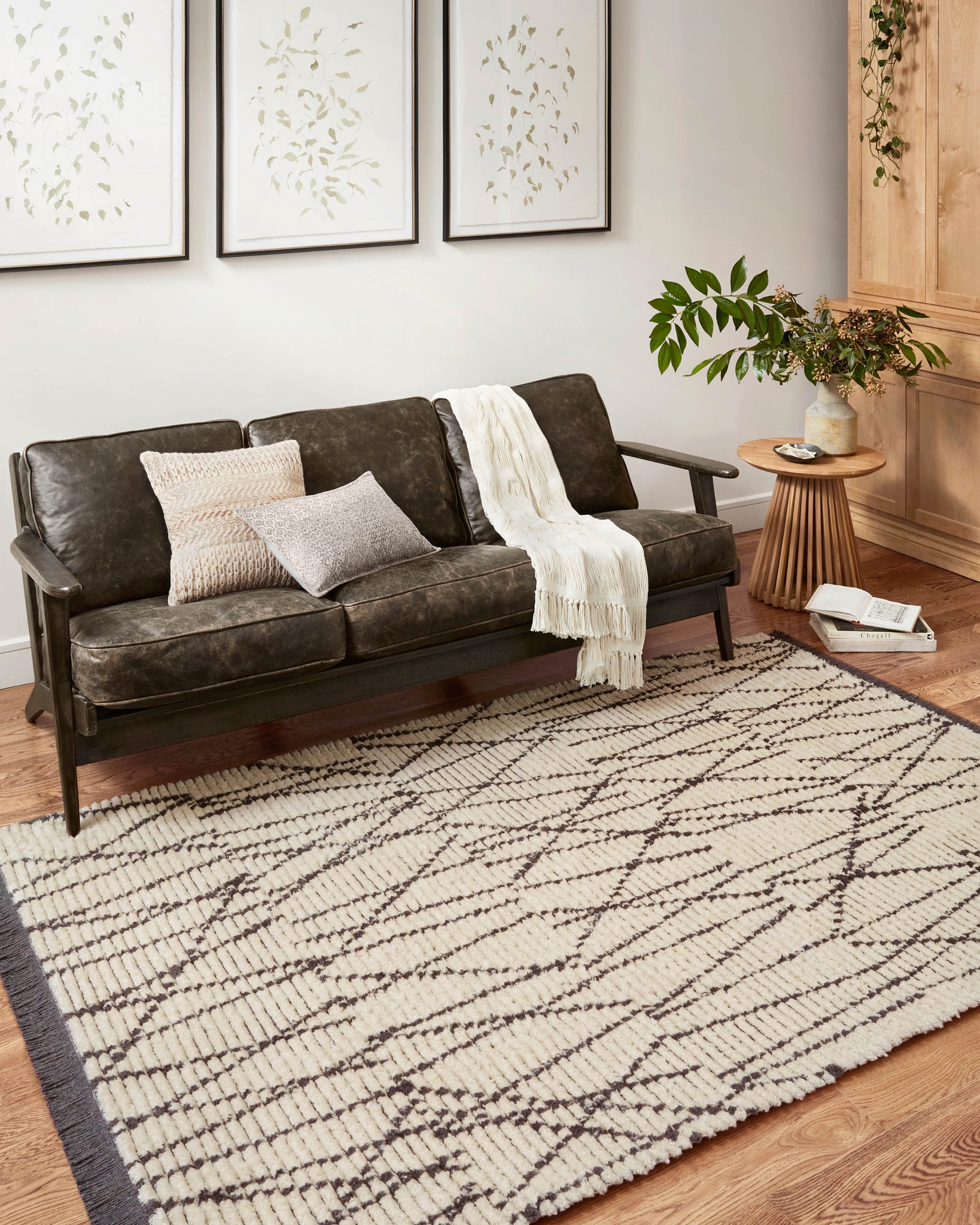 angle view of Alice Cream / Charcoal by Chris Loves Julia x Loloi luxury Rug