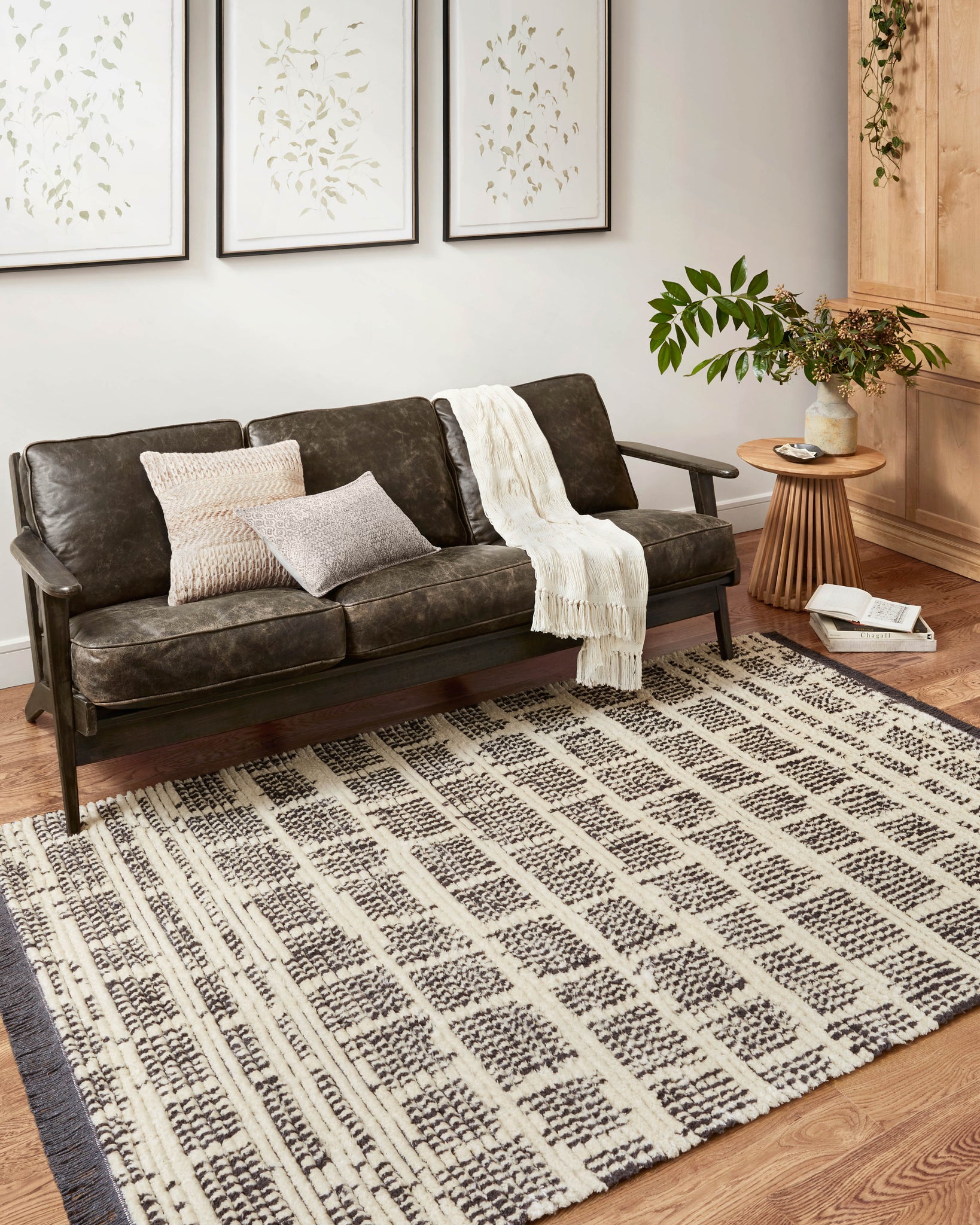 angle view of Alice Cream / Charcoal by Chris Loves Julia x Loloi luxury Rug