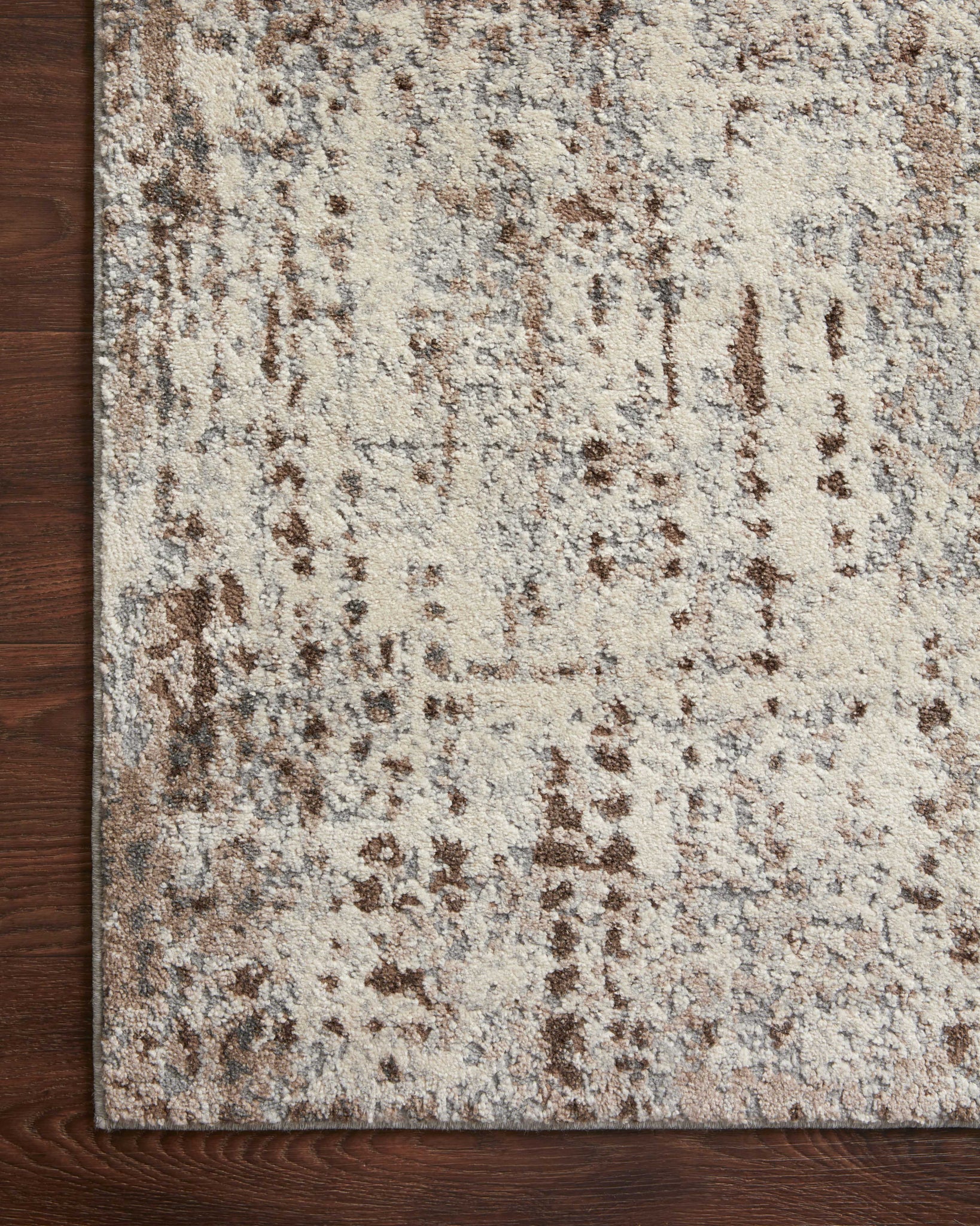 lifestyle view of Austen Natural / Mocha luxury Rug