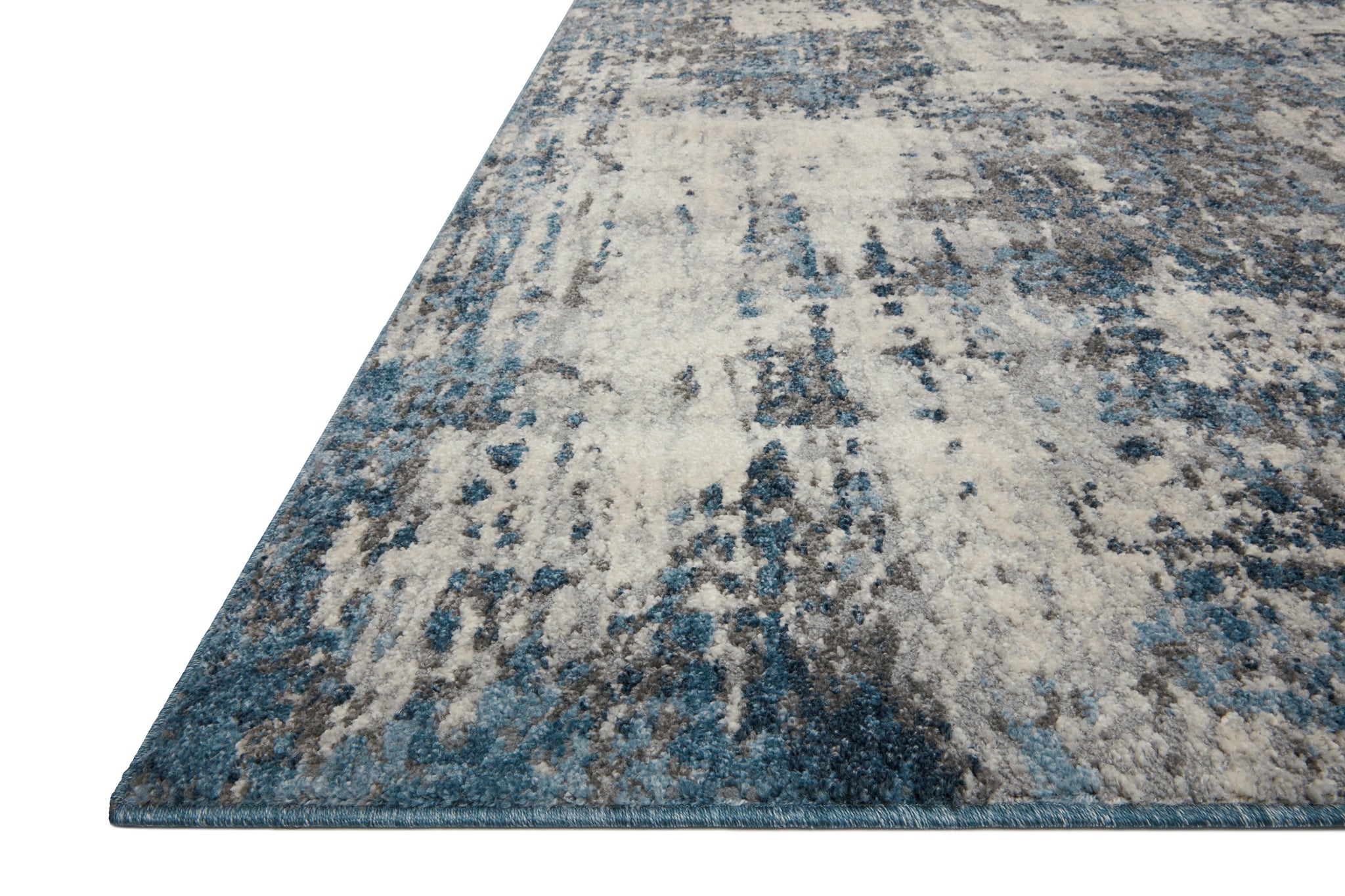side view of Austen Natural / Ocean luxury Rug