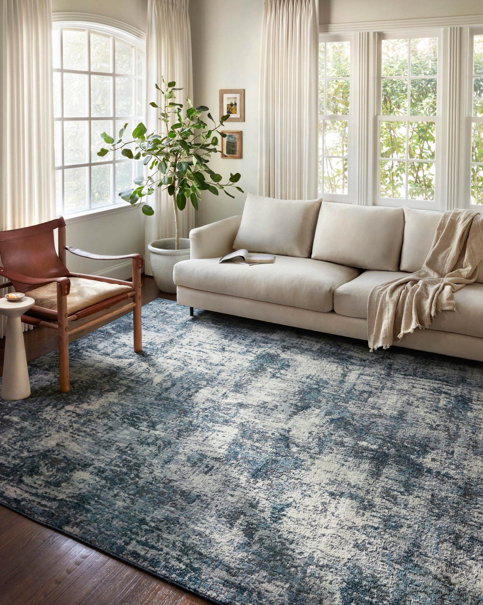 angle view of Austen Natural / Ocean luxury Rug