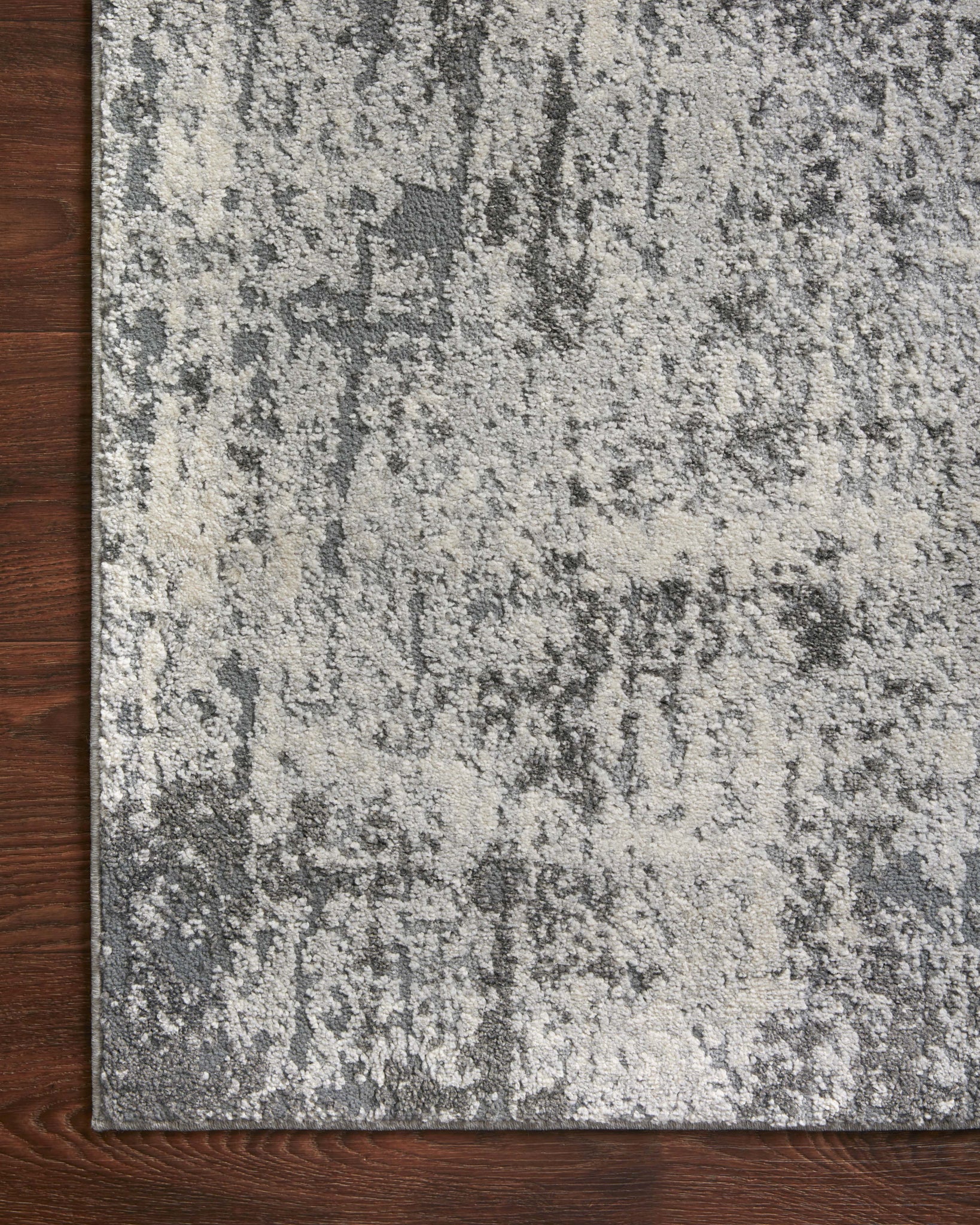 lifestyle view of Austen Pebble / Charcoal luxury Rug