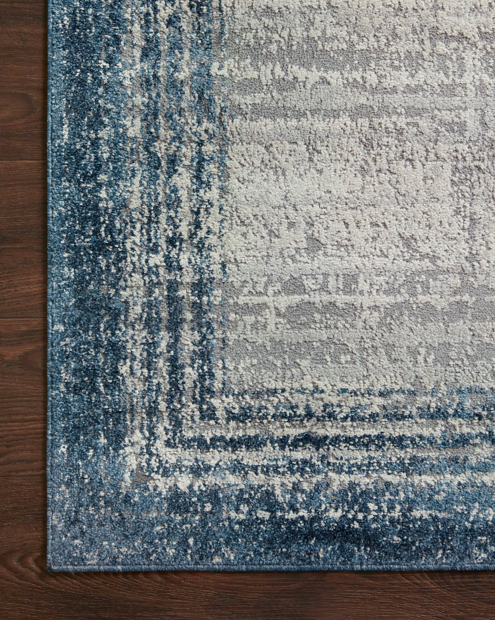 lifestyle view of Austen Pebble / Blue luxury Rug
