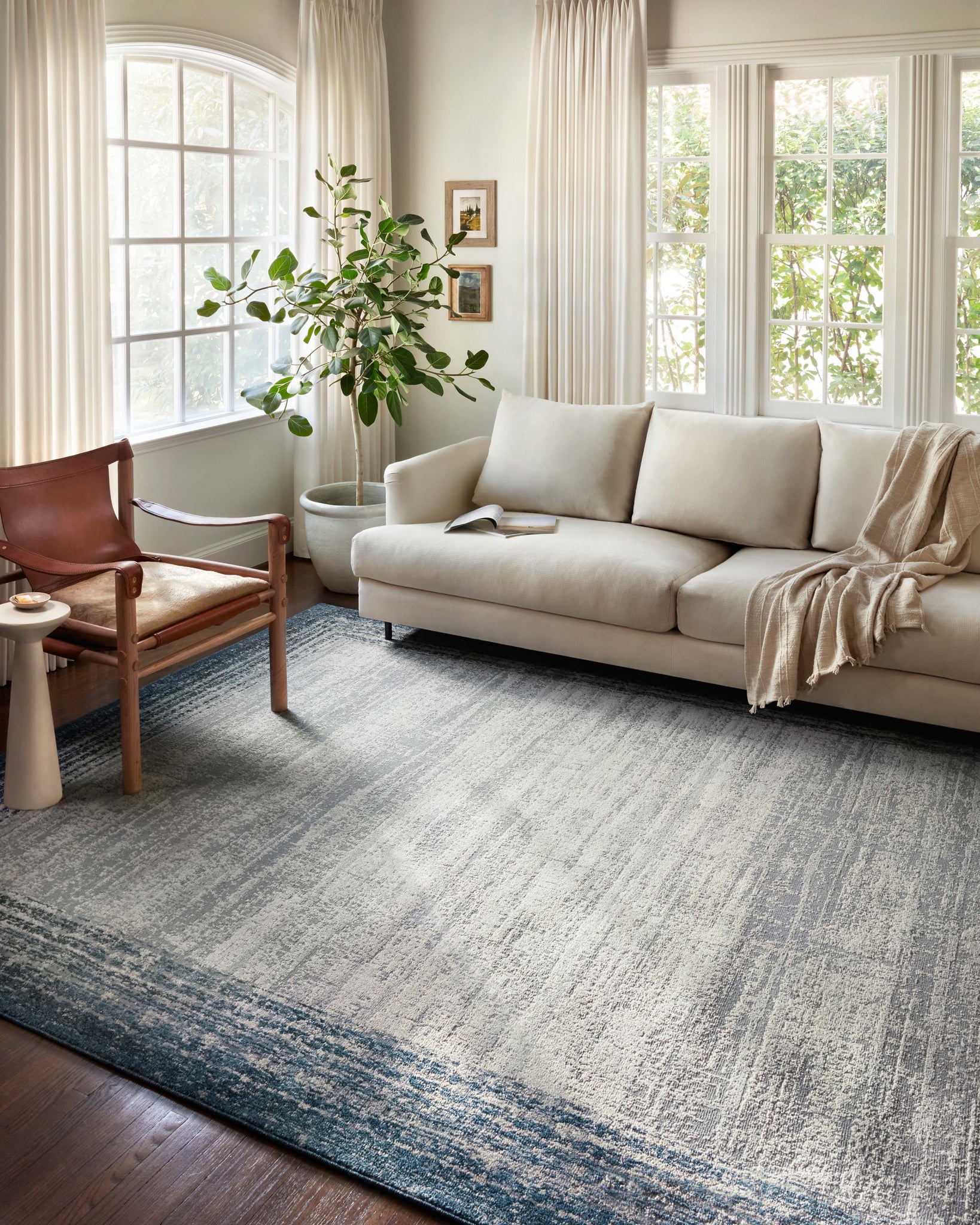 angle view of Austen Pebble / Blue luxury Rug