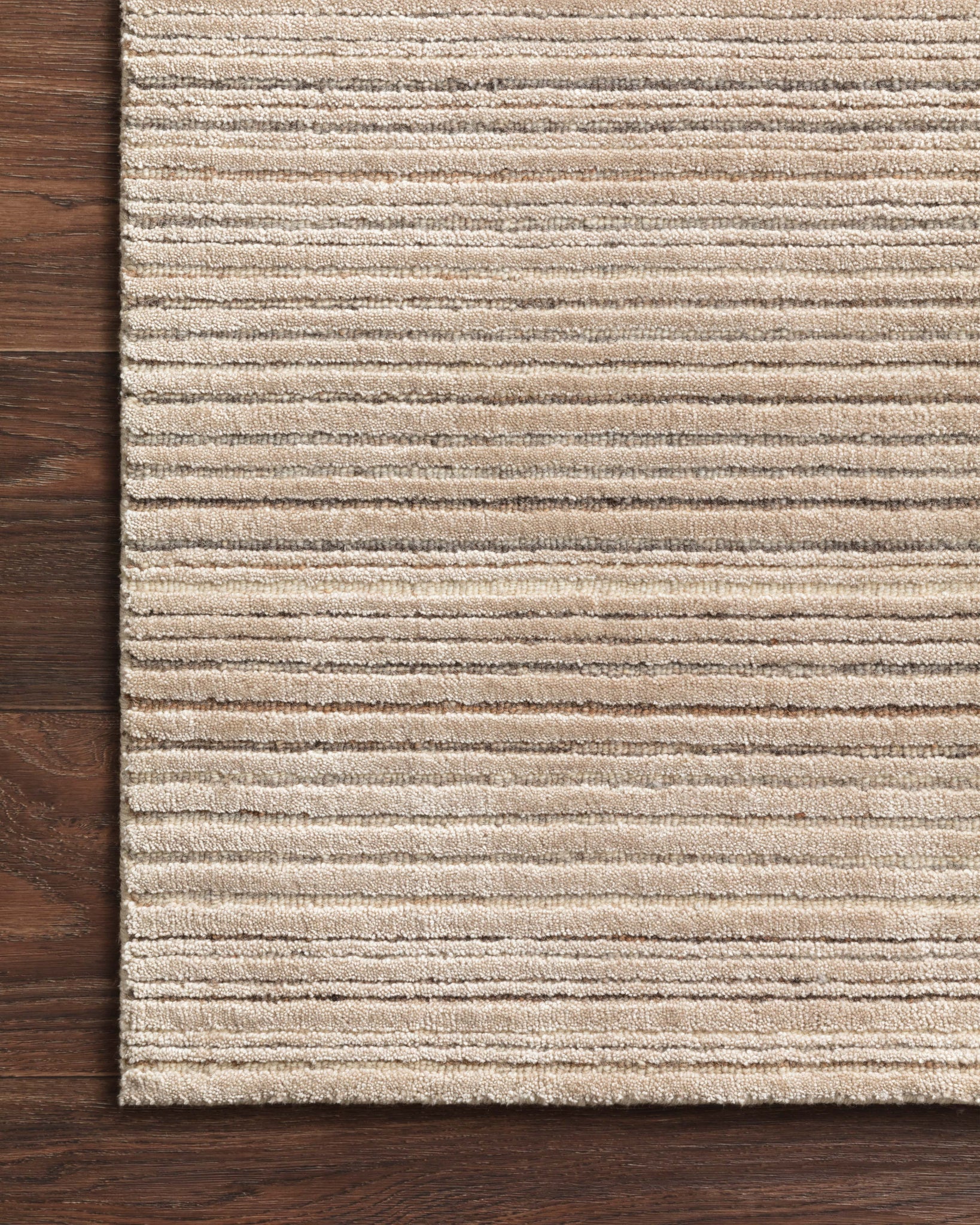 side view of Bellamy Oatmeal luxury Rug