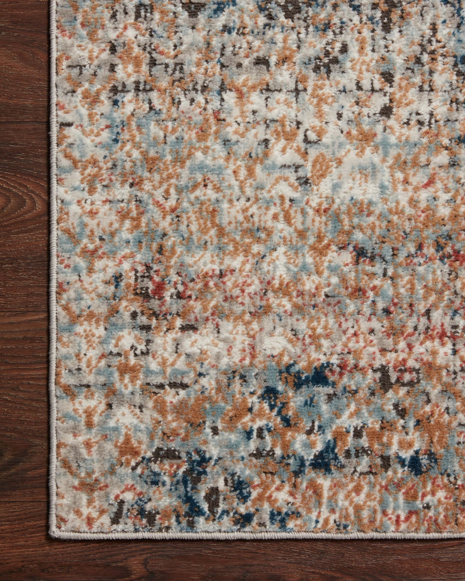 front view of Bianca Ocean / Spice luxury Rug