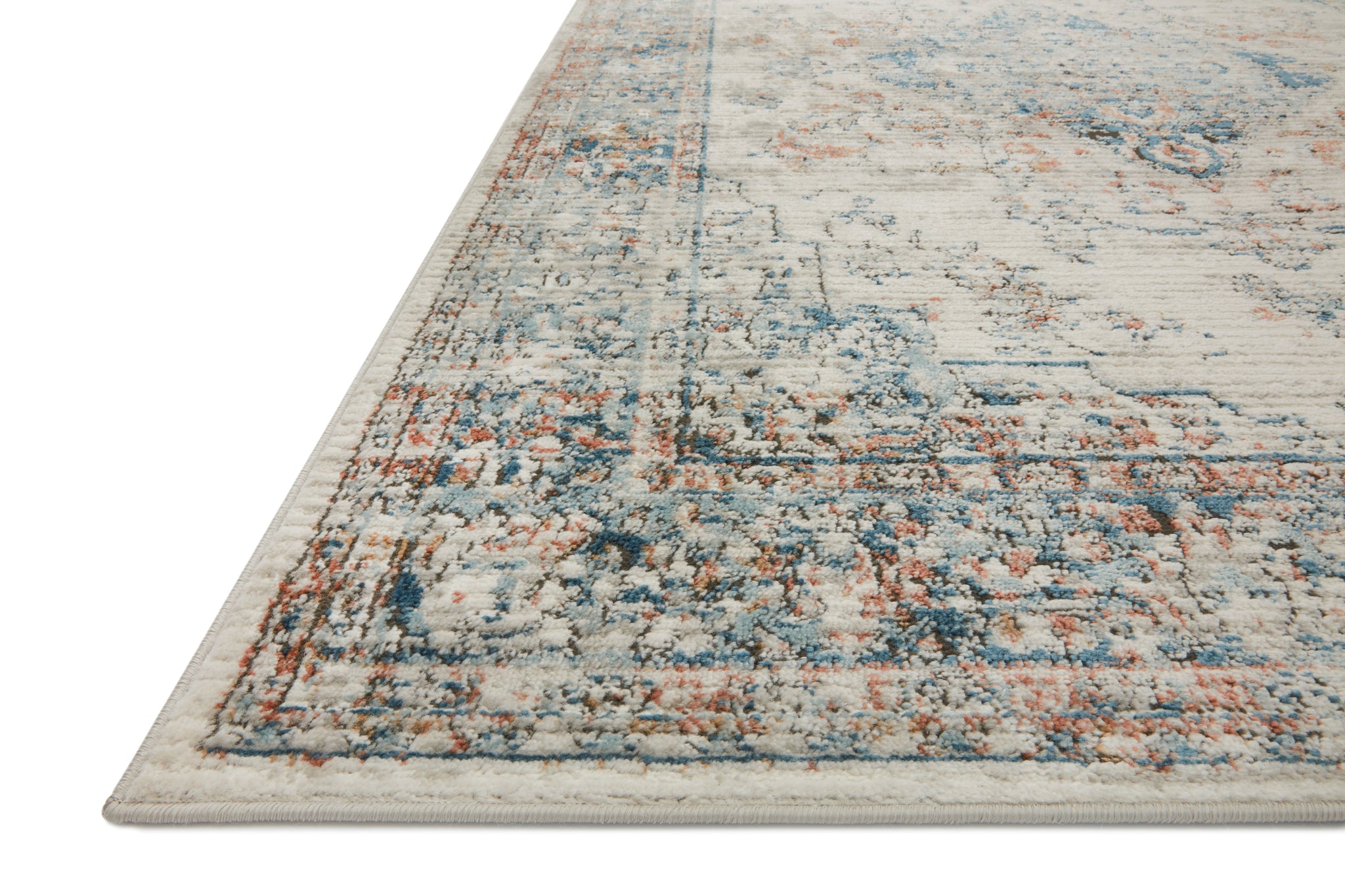 angle view of Bianca Ivory / Ocean luxury Rug