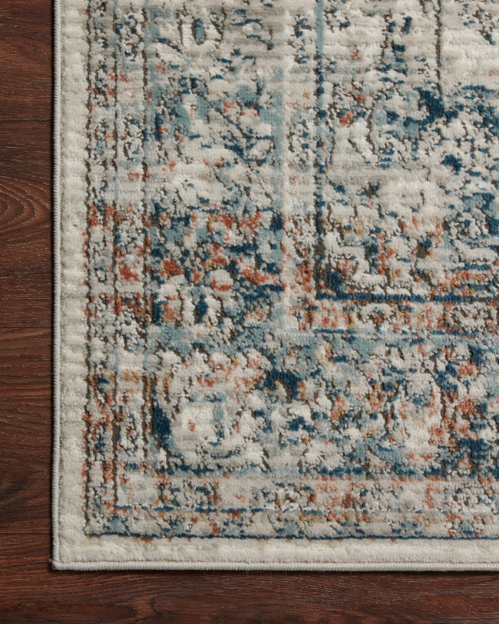 detail view of Bianca Ivory / Ocean luxury Rug