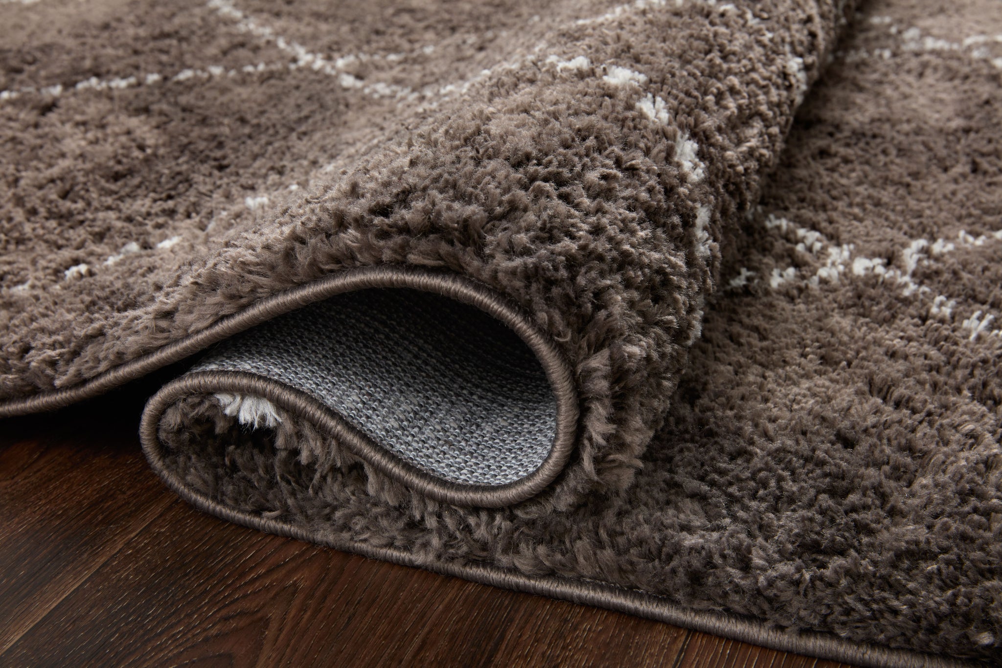 detail view of Bliss Shag Grey / White luxury Rug