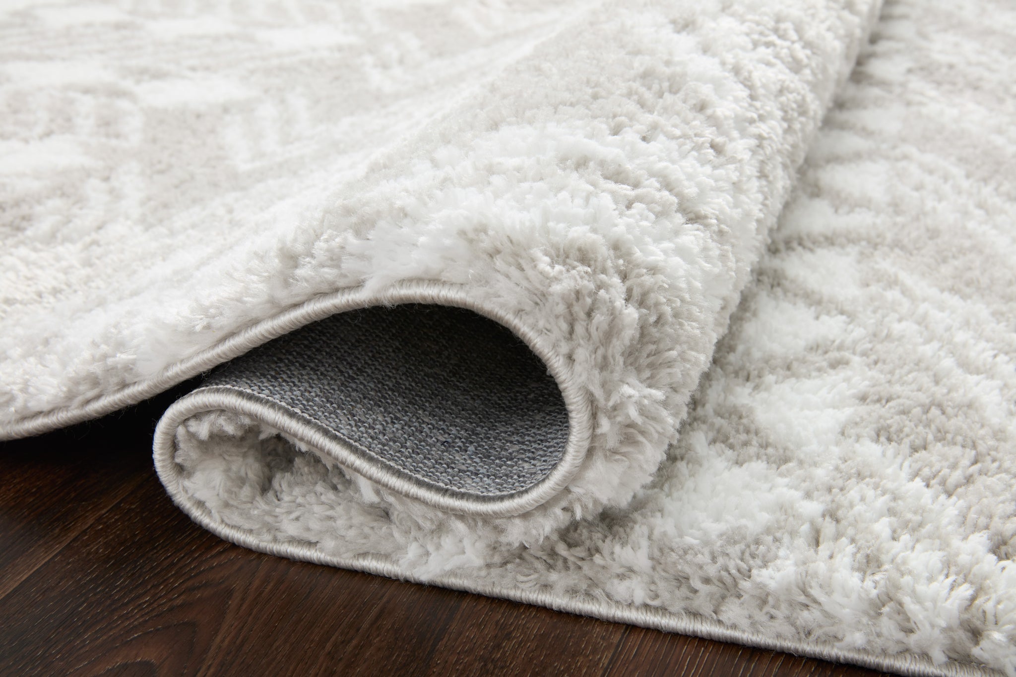 detail view of Bliss Shag Grey / White luxury Rug
