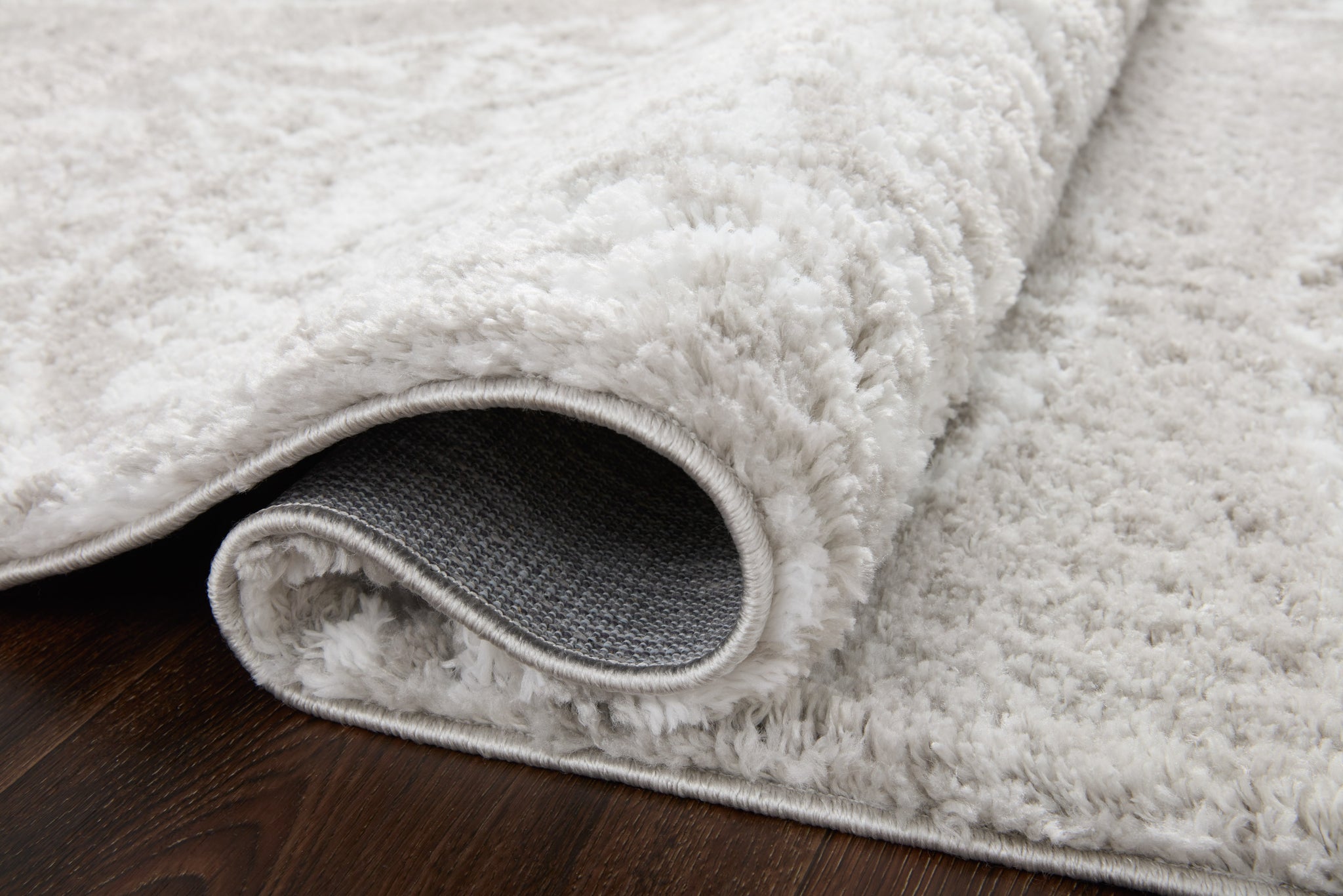 detail view of Bliss Shag Grey / White luxury Rug