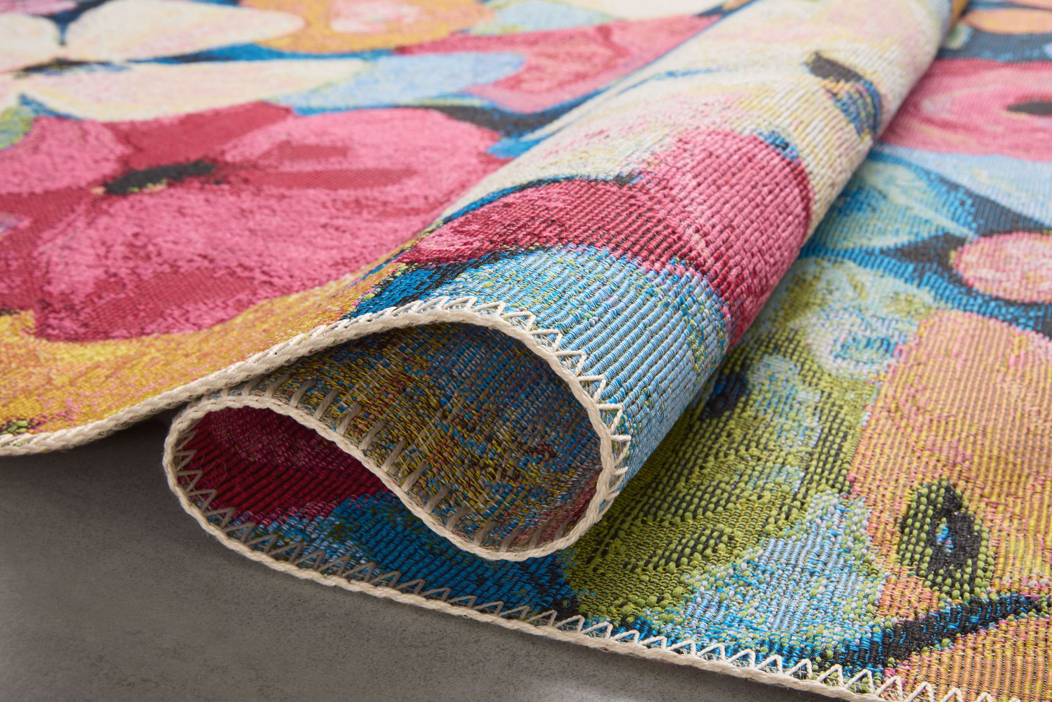 detail view of Botanical Navy / Multi luxury Rug