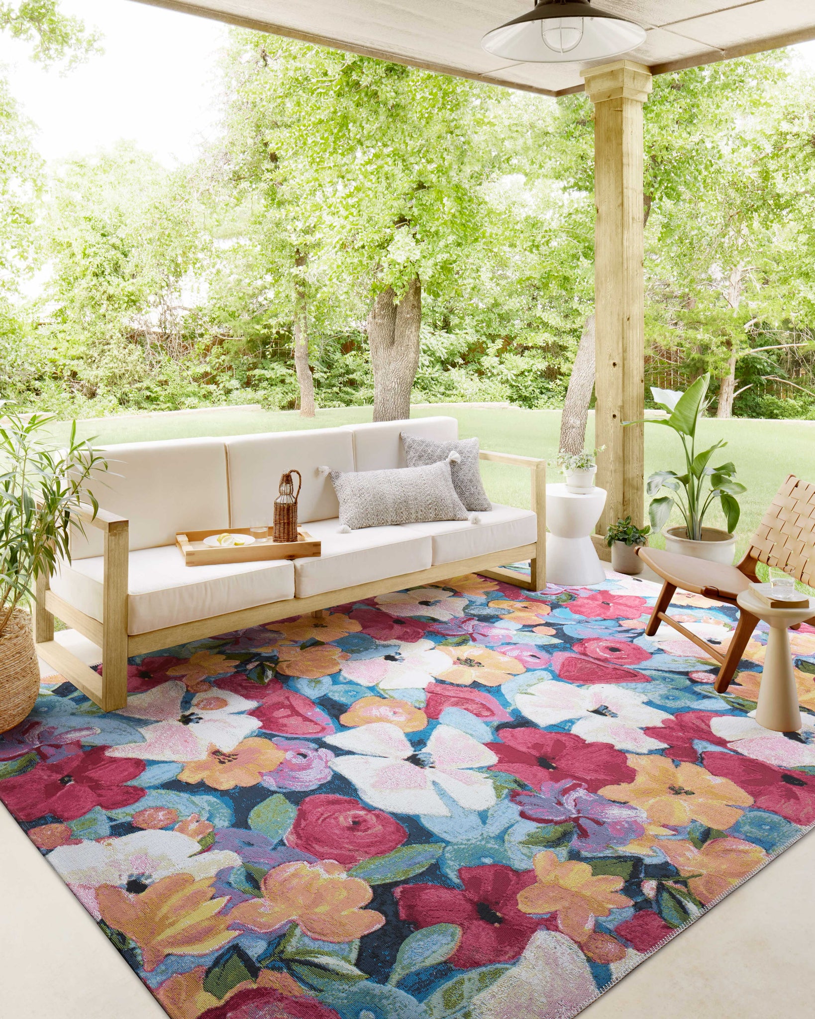 angle view of Botanical Navy / Multi luxury Rug
