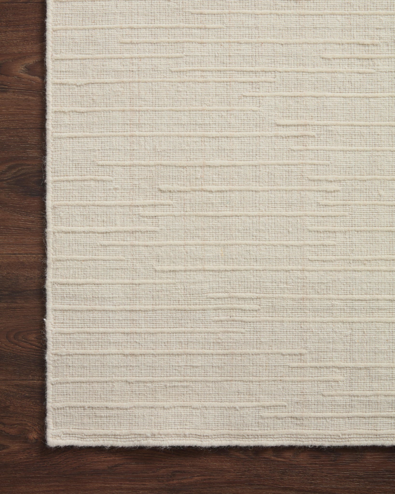 side view of Brooks Ivory luxury Rug
