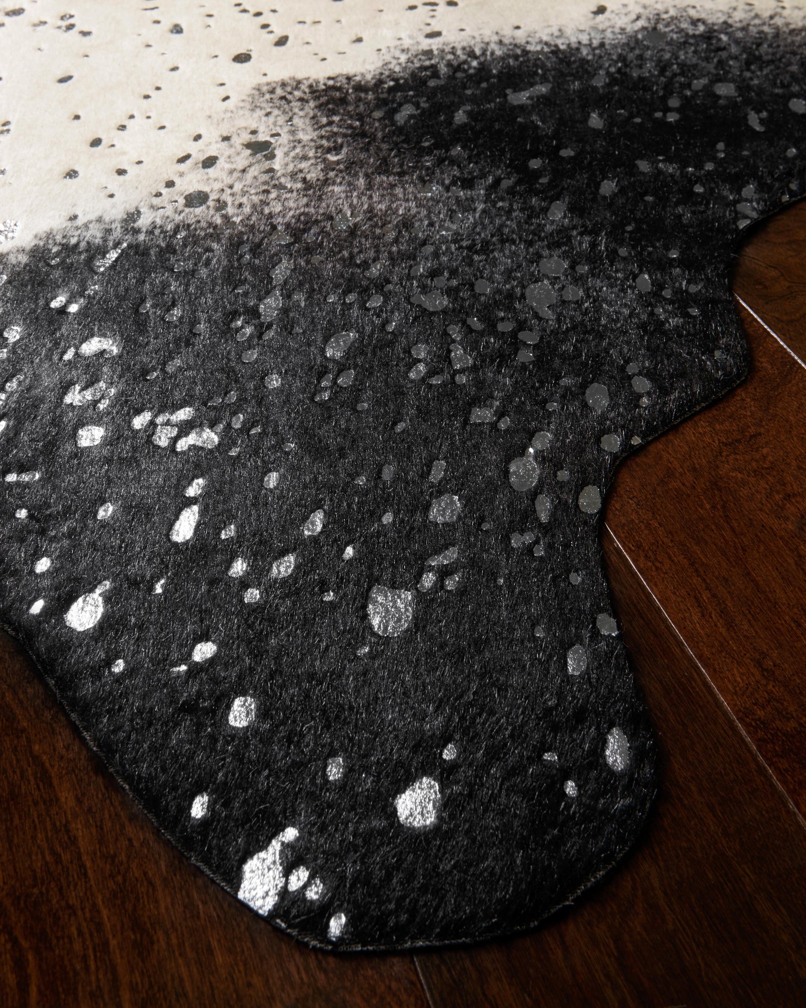 side view of Bryce Black / Silver luxury Rug