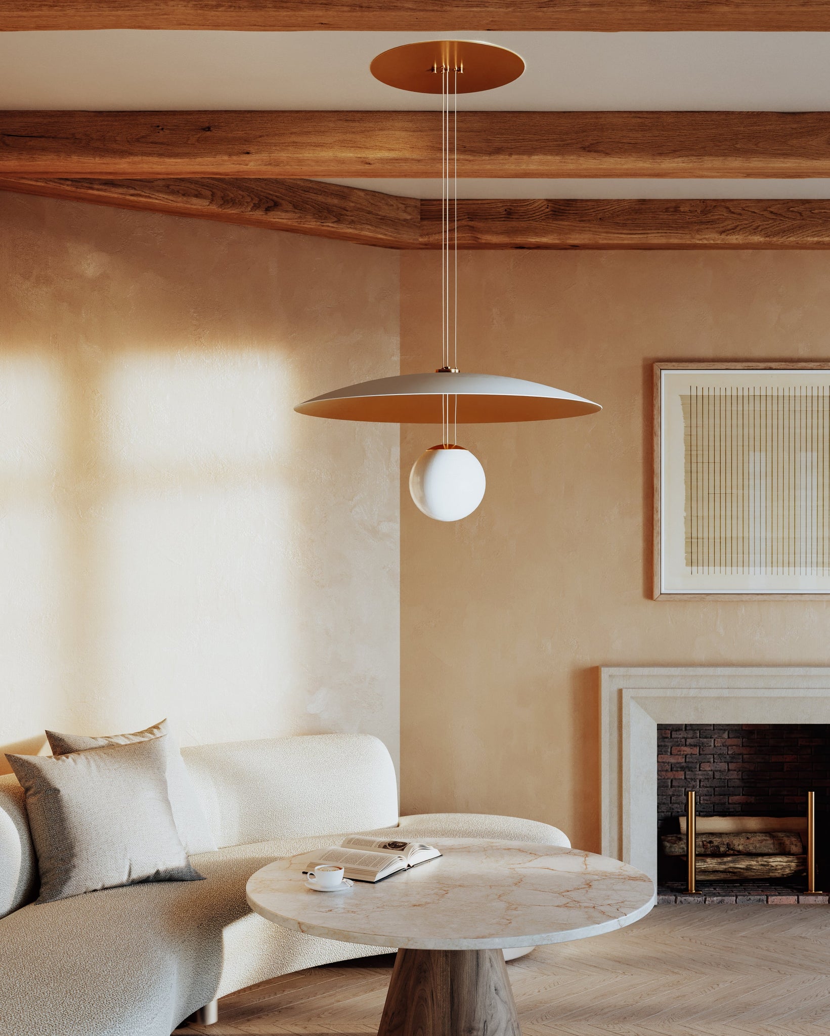 Brim Chandelier styled in an elegant dining room for warm, layered light at Laurie Yapp Home.