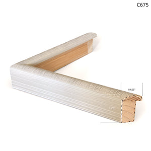 White textured picture frame corner with wood backing, showcasing a modern design.