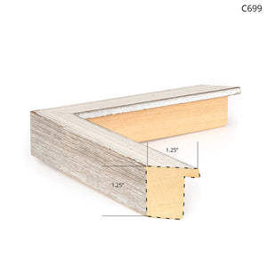 Framed wall art corner showing a textured light wood frame with a gold inner edge