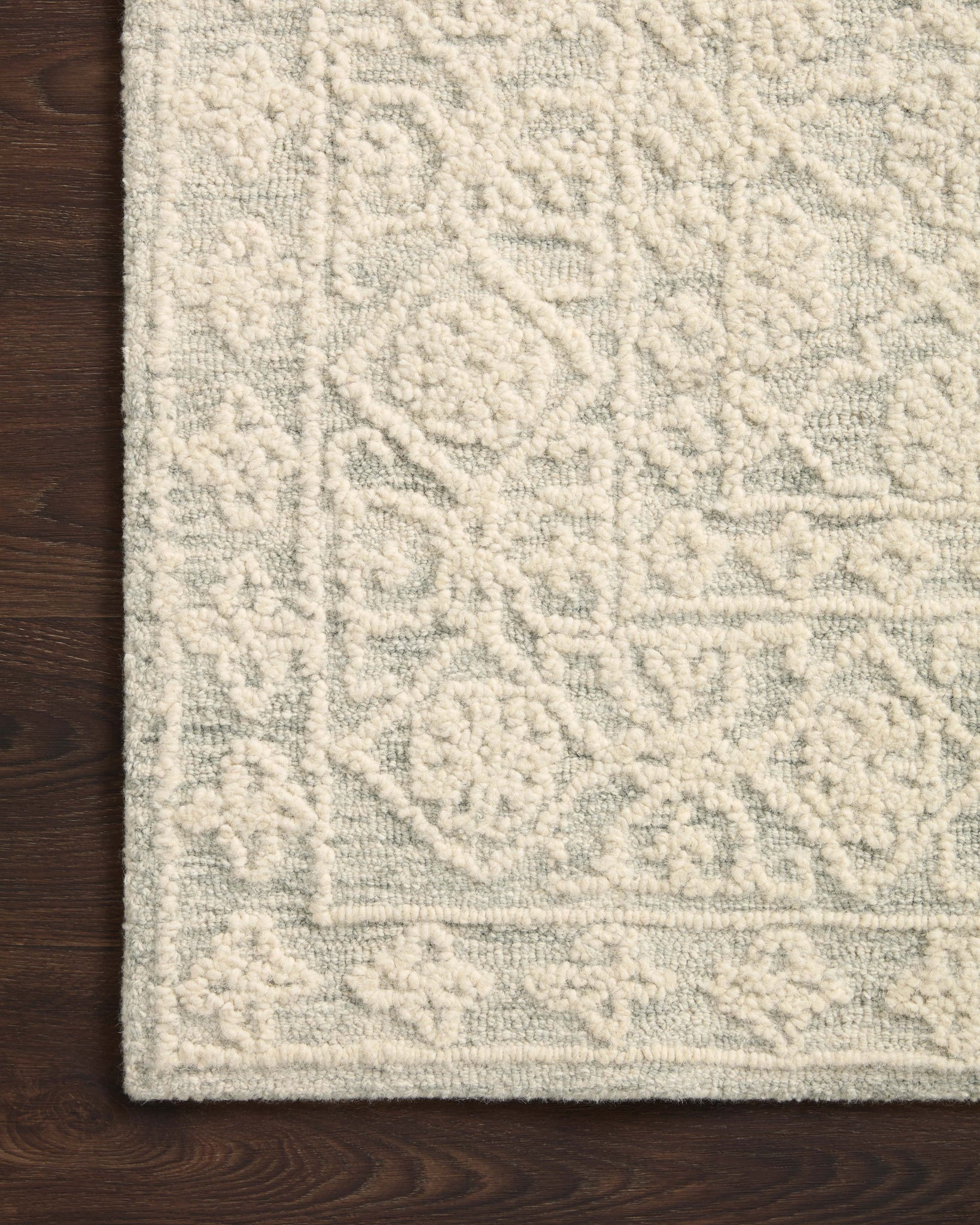 side view of Cecelia Mist / Ivory luxury Rug
