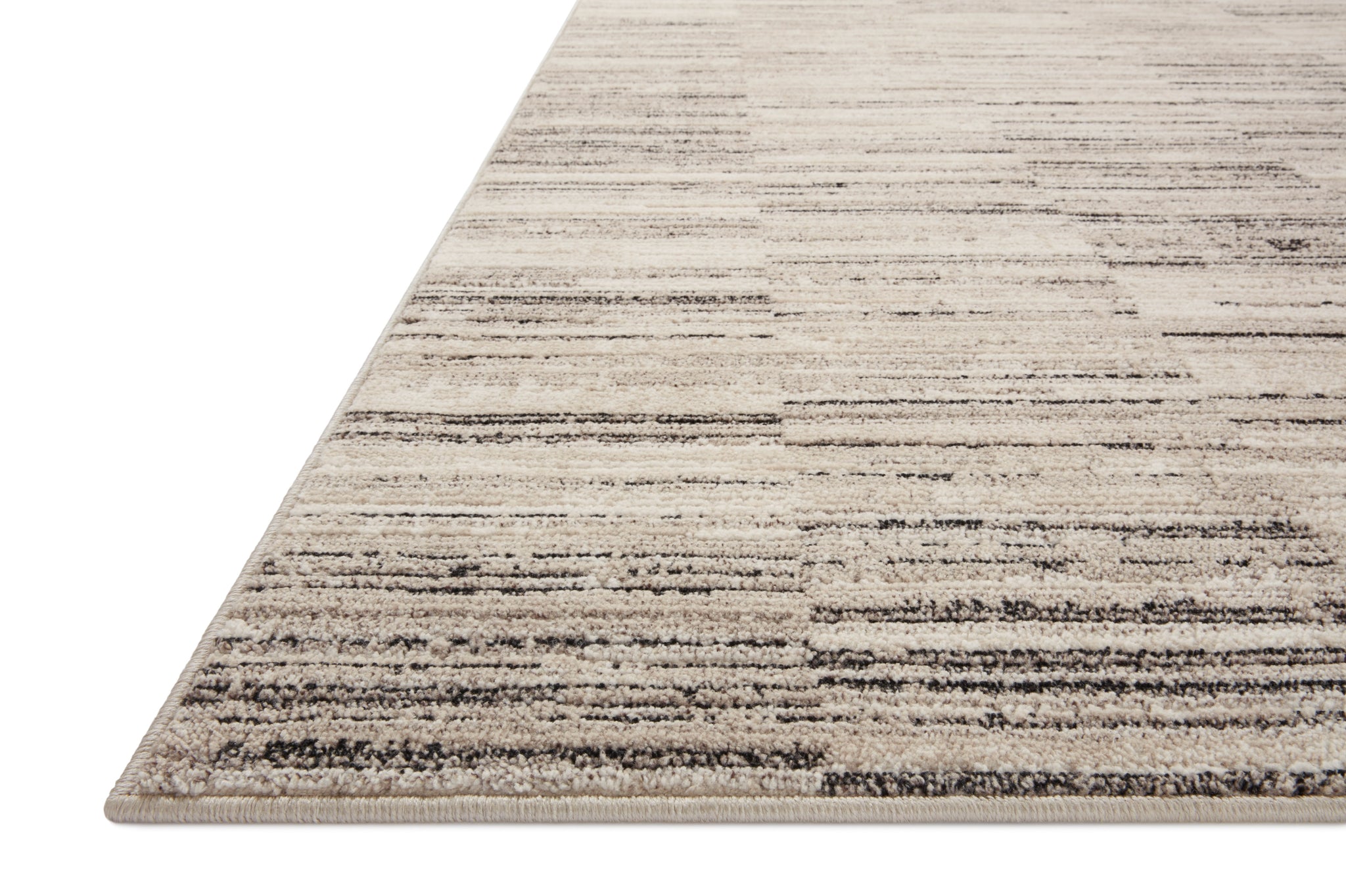 side view of Darby Charcoal / Sand luxury Rug