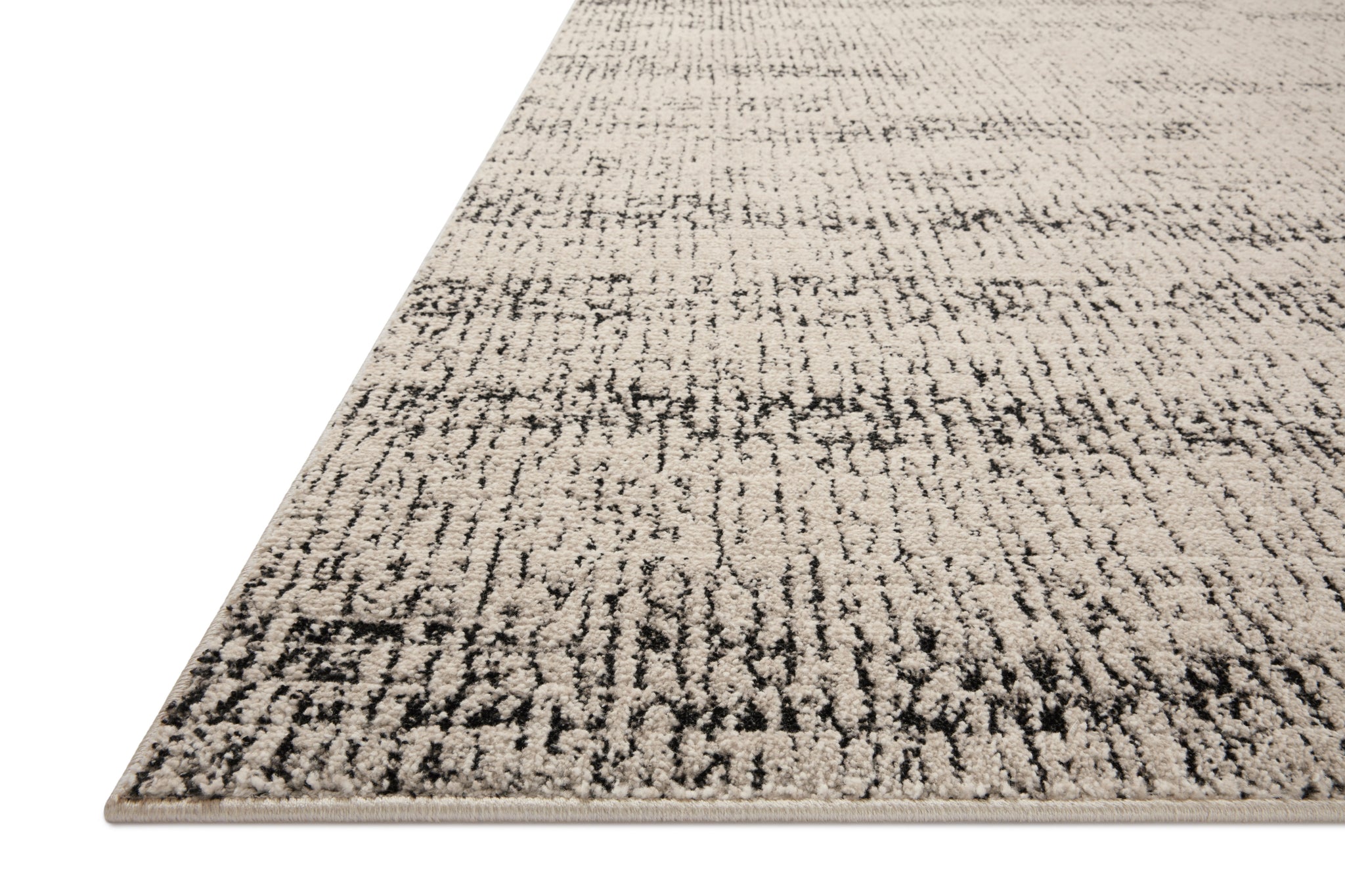 side view of Darby Oatmeal / Charcoal luxury Rug
