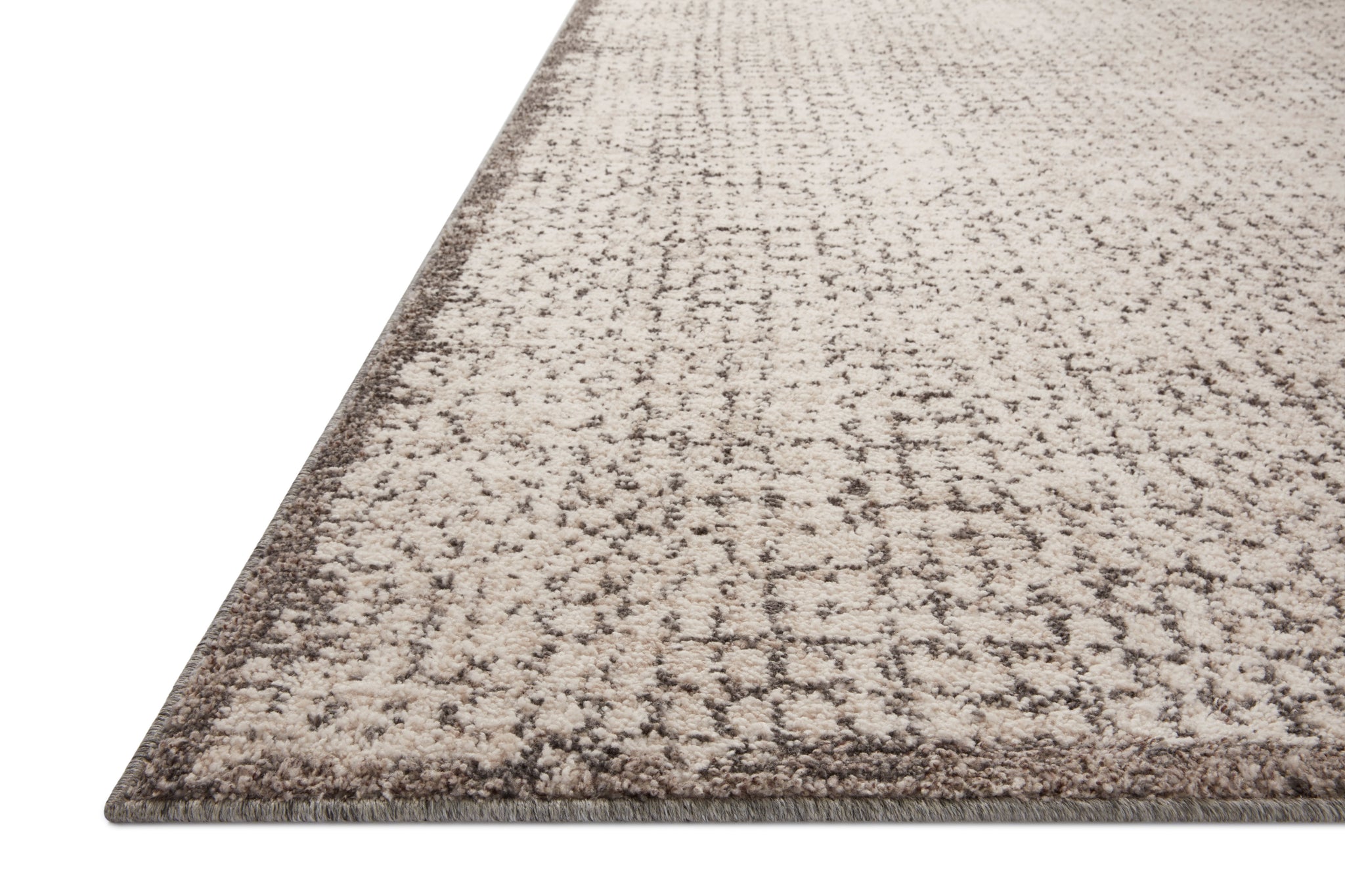 side view of Darby Ivory / Stone luxury Rug