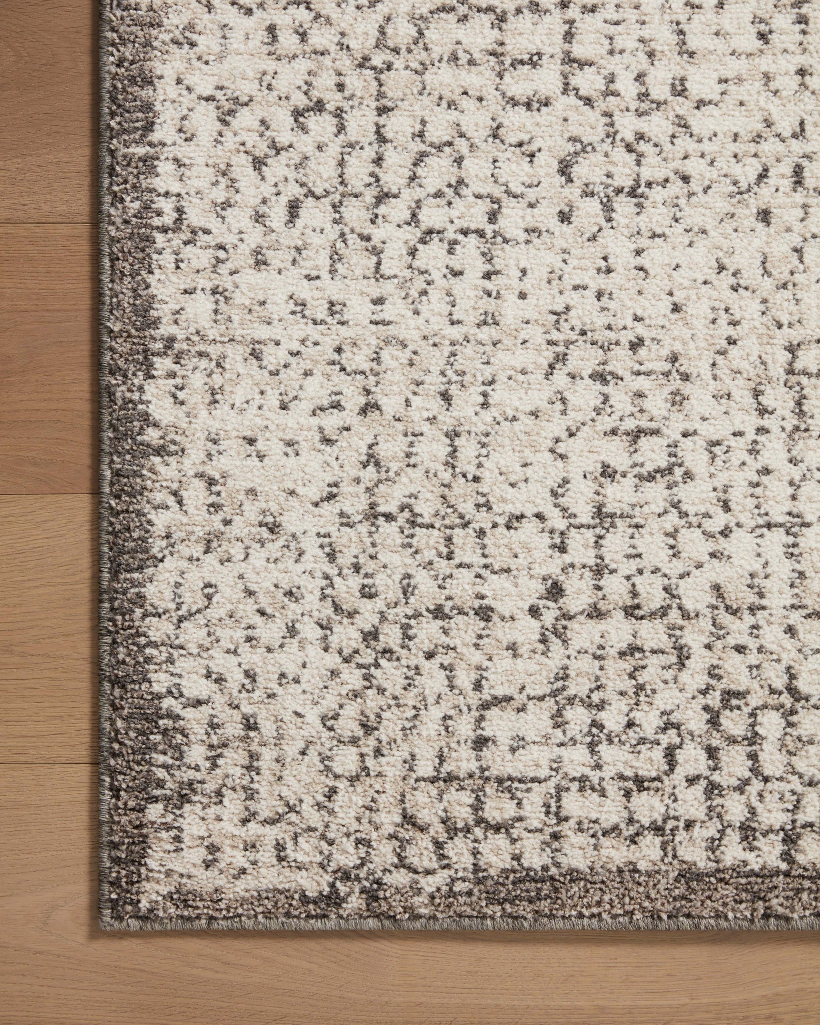 lifestyle view of Darby Ivory / Stone luxury Rug
