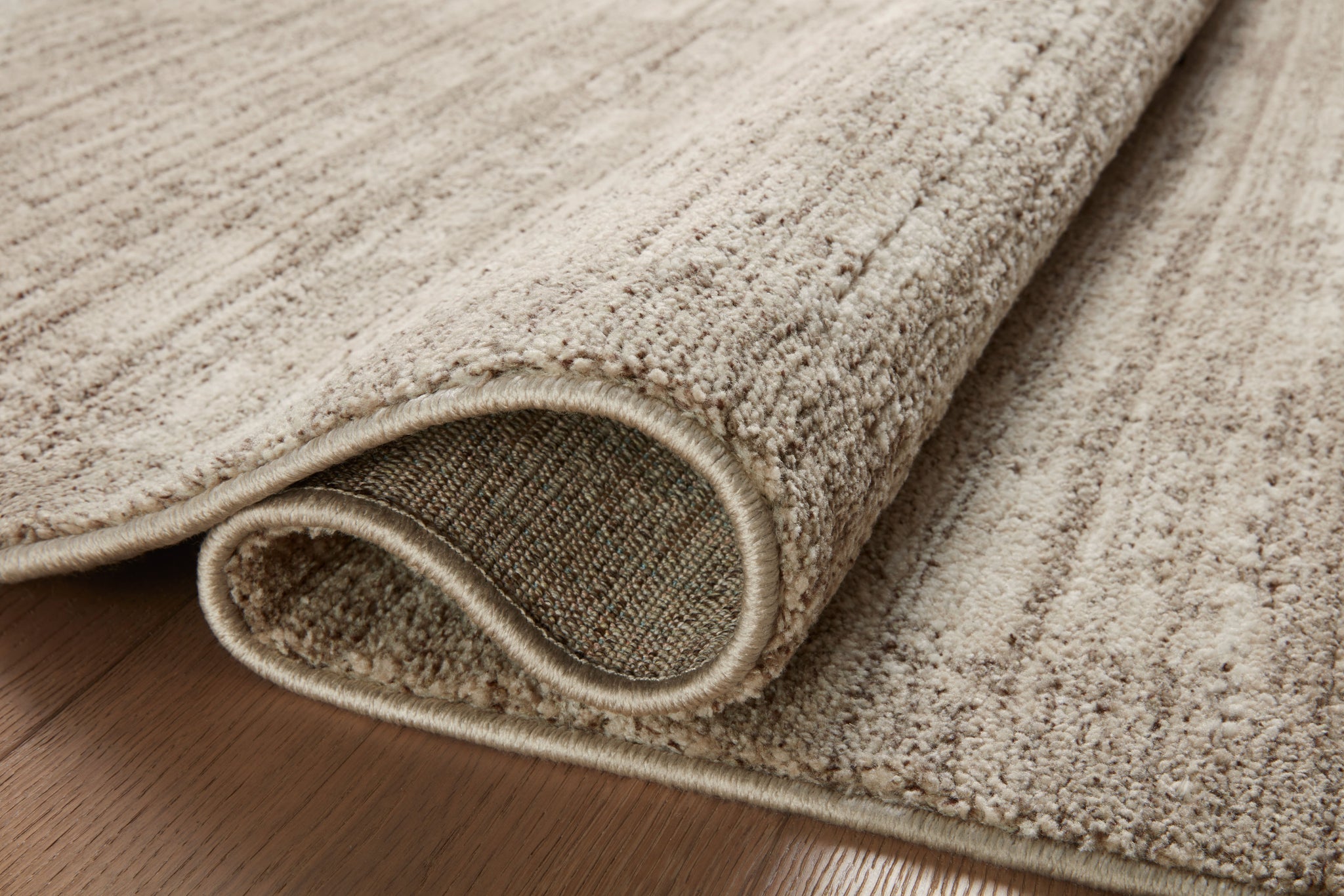 detail view of Darby Pebble / Sand luxury Rug