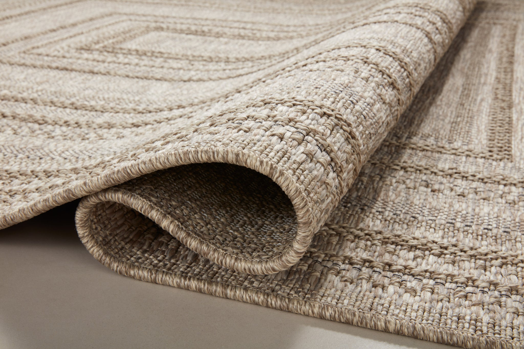 side view of Dawn Natural luxury Rug