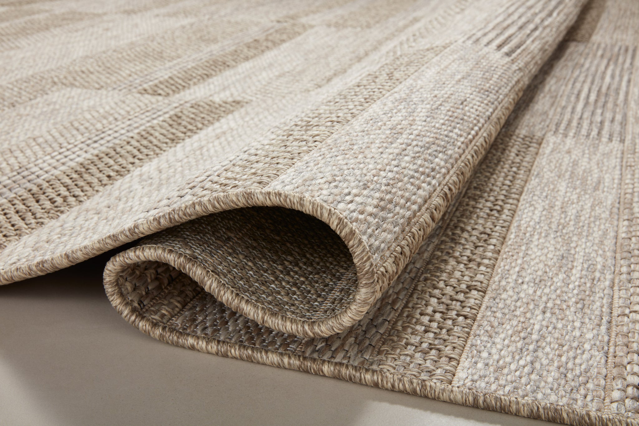 side view of Dawn Natural luxury Rug