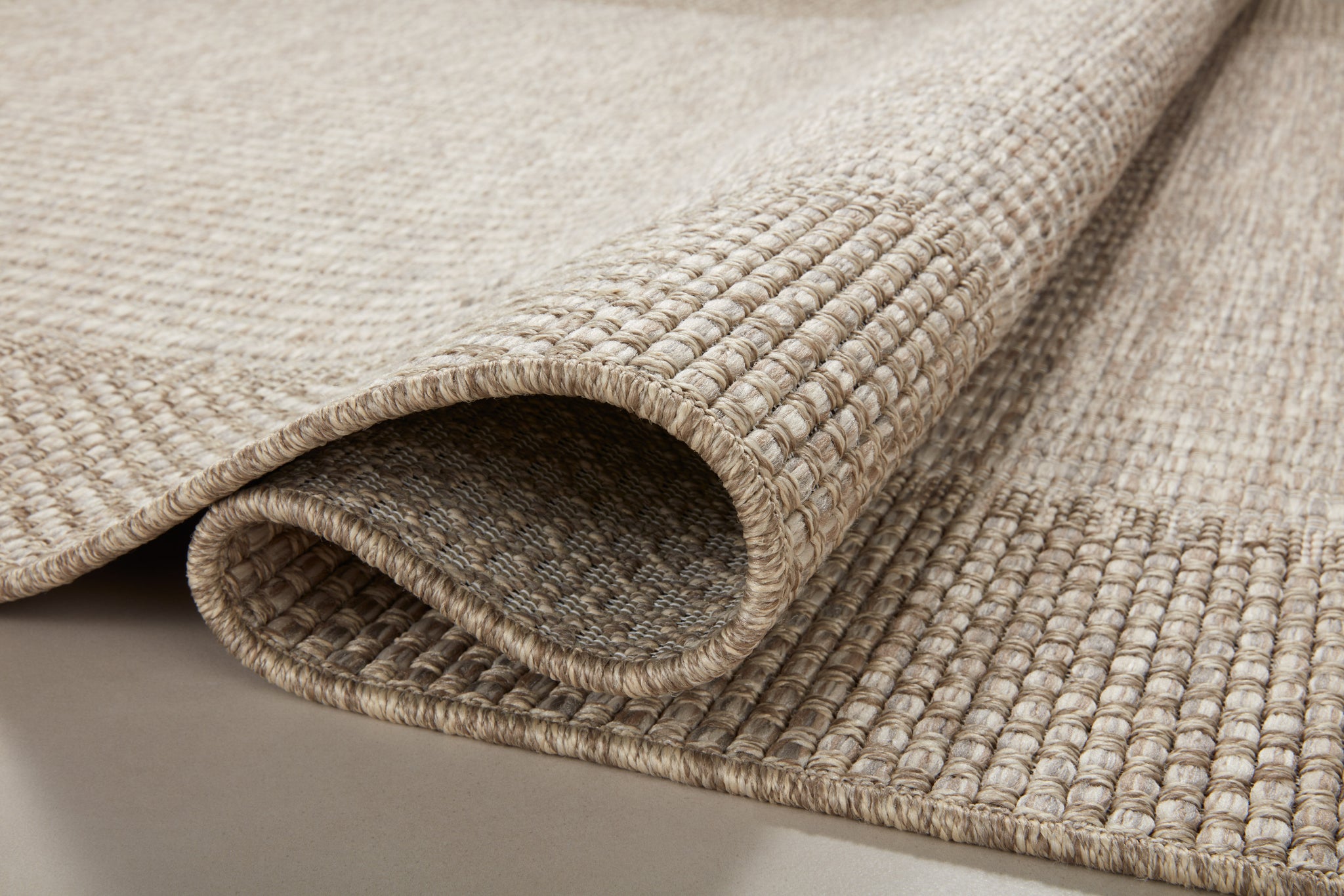 side view of Dawn Natural luxury Rug