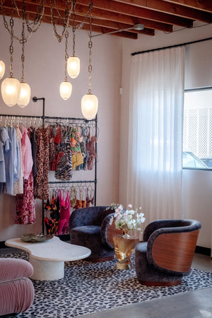 Daith Chandelier 61.25" styled in a two-story entry for warm, layered light at Laurie Yapp Home.
