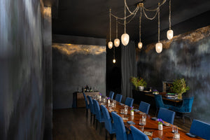 Daith Chandelier 61.25" styled in a two-story entry for warm, layered light at Laurie Yapp Home.