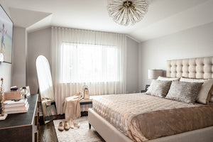Dunkirk Semi Flush 30" in aged brass styled in a hallway for warm, layered light at Laurie Yapp Home.