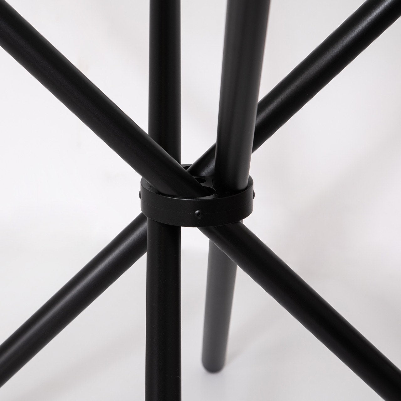 Close-up of black metal frame on a white background