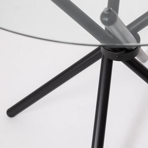 Close-up of a gray metal chair base on a white background