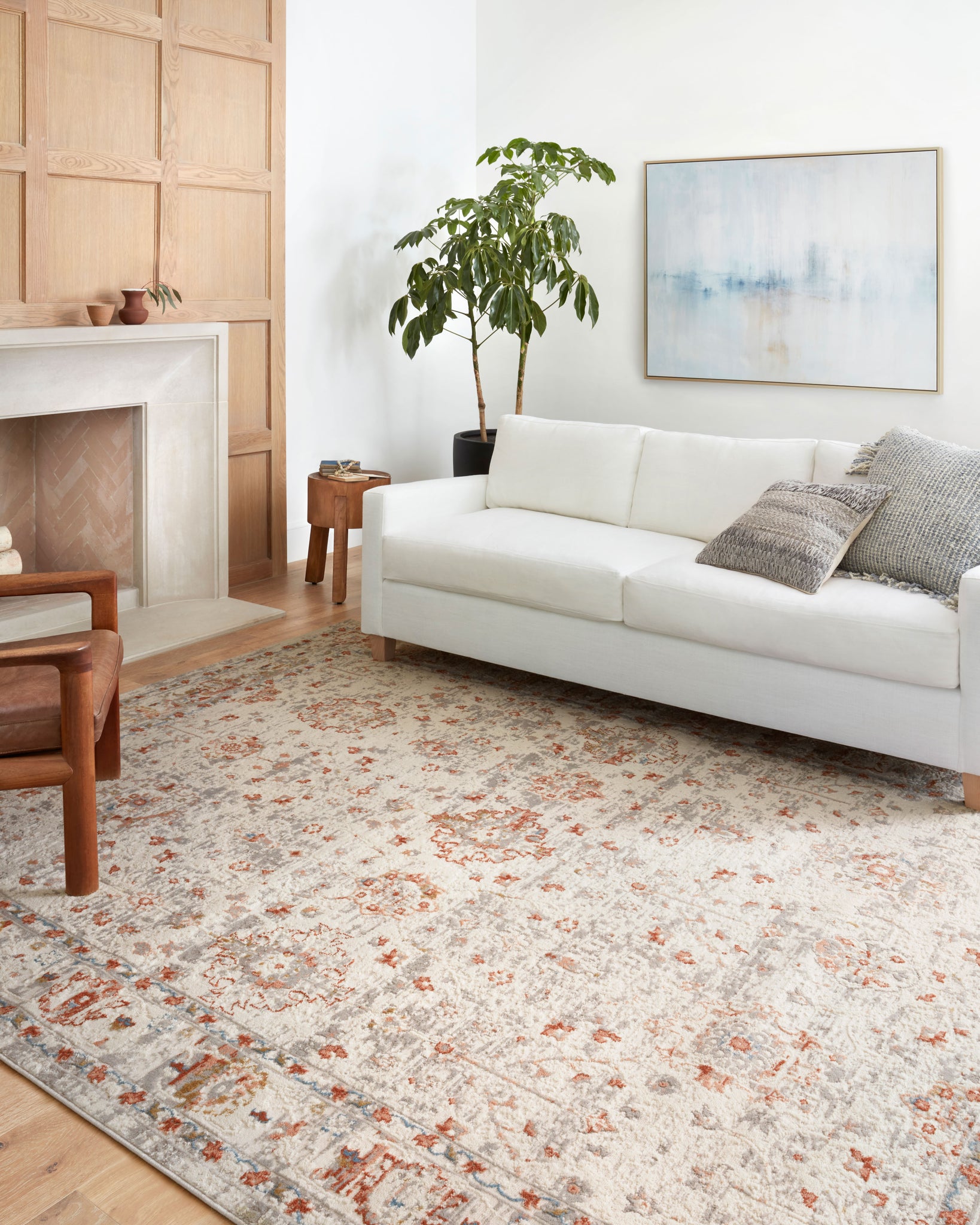 angle view of Estelle Ivory / Rust luxury Rug