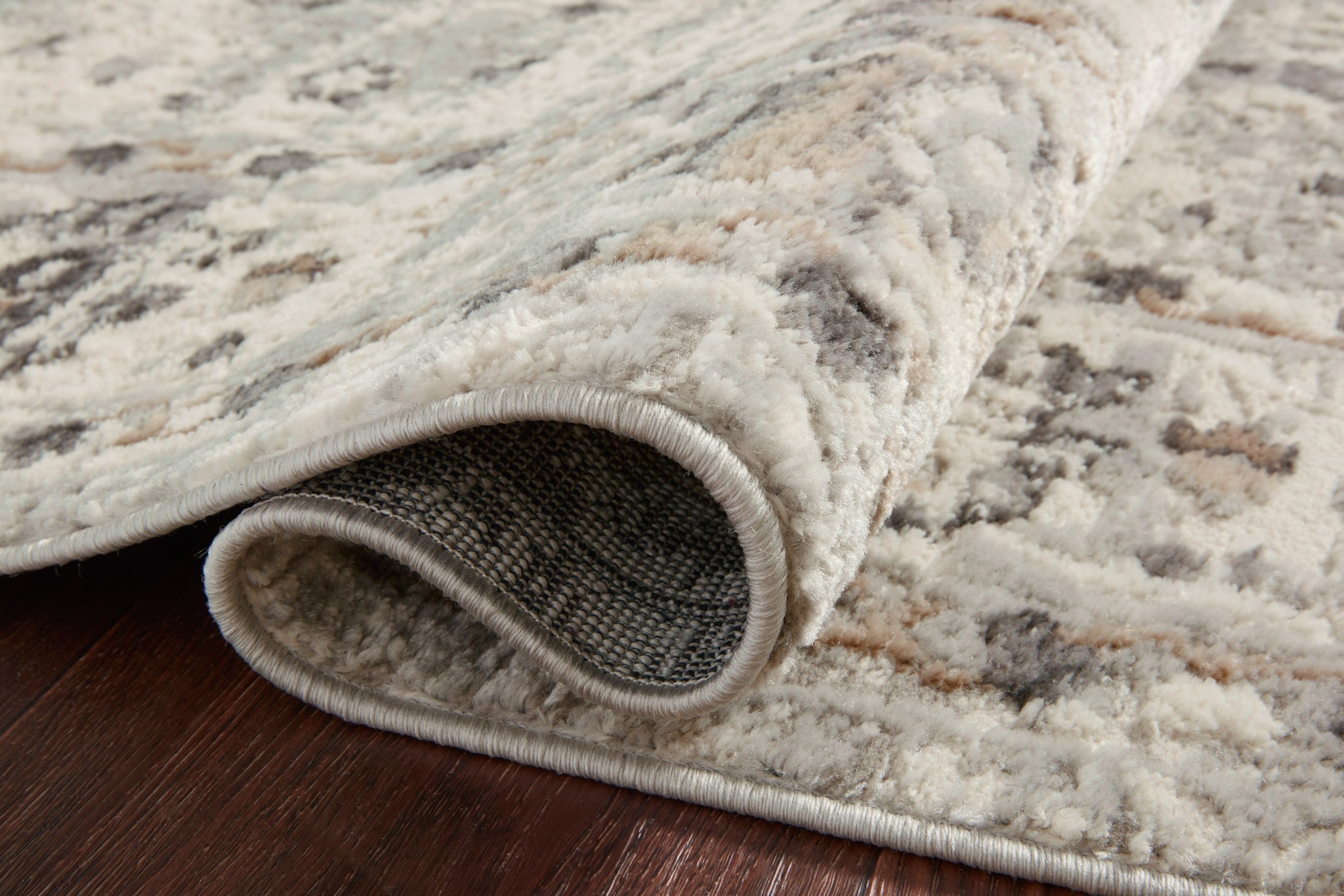 angle view of Estelle Ivory / Stone luxury Rug
