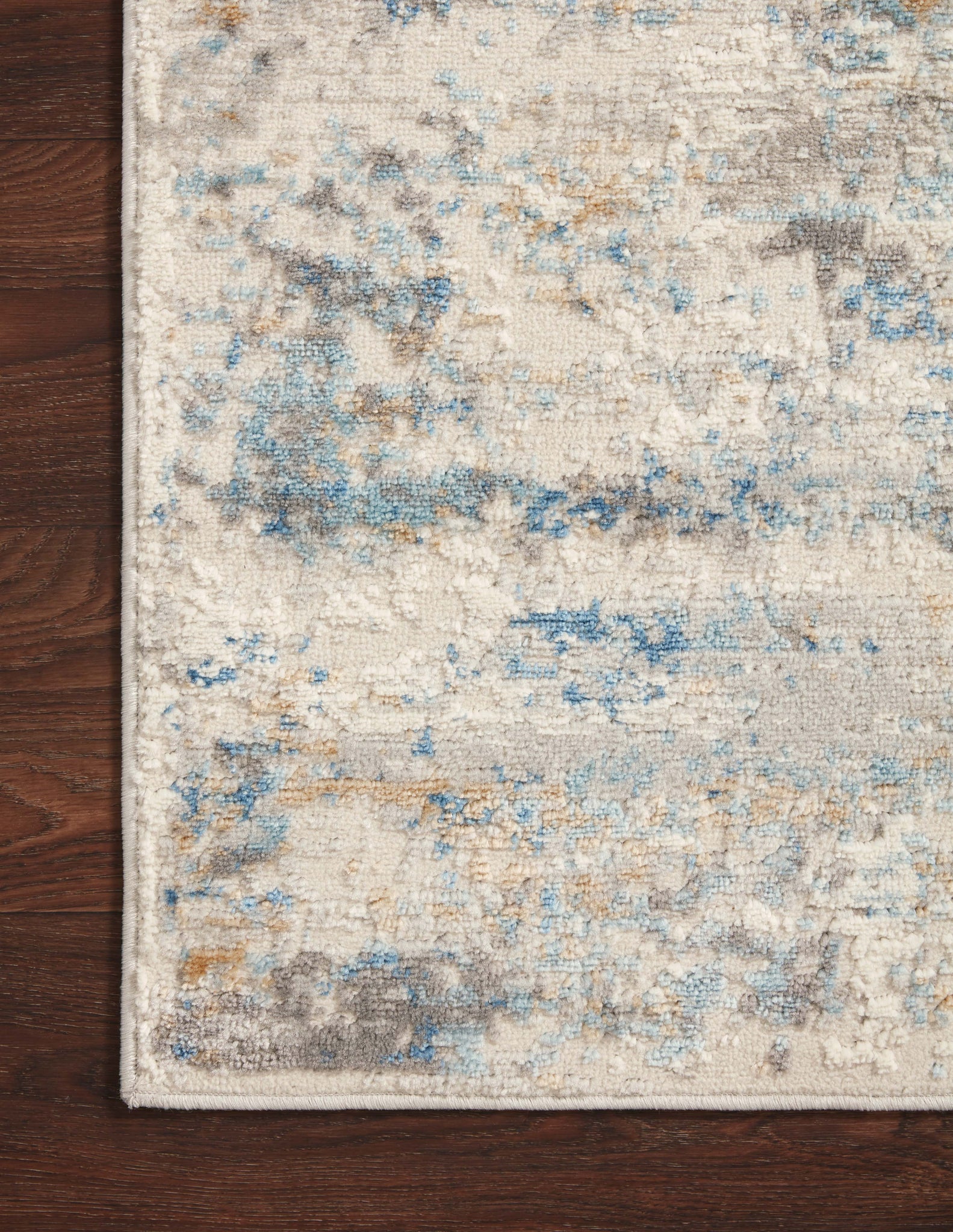 lifestyle view of Estelle Ivory / Ocean luxury Rug