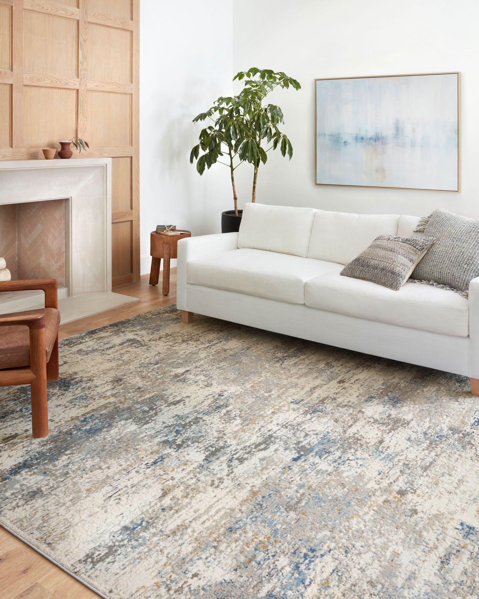 front view of Estelle Ivory / Ocean luxury Rug