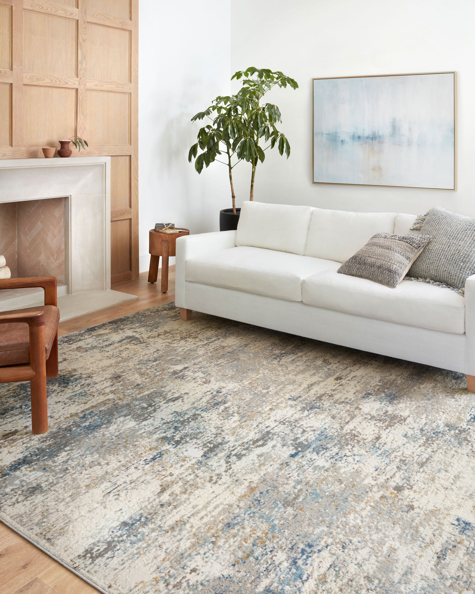 angle view of Estelle Ivory / Ocean luxury Rug