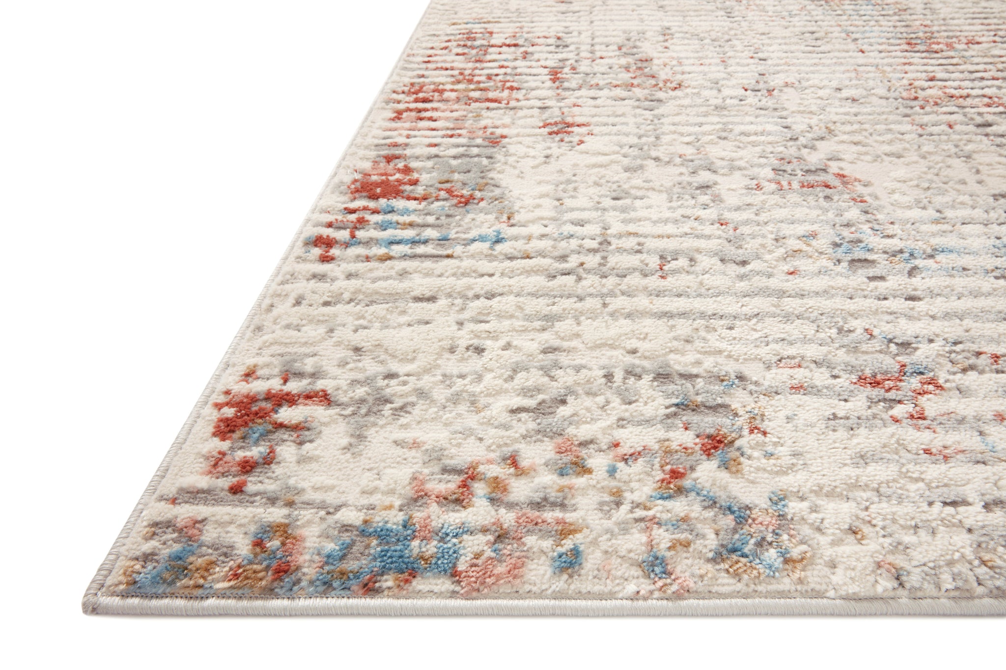 side view of Estelle Ivory / Multi luxury Rug