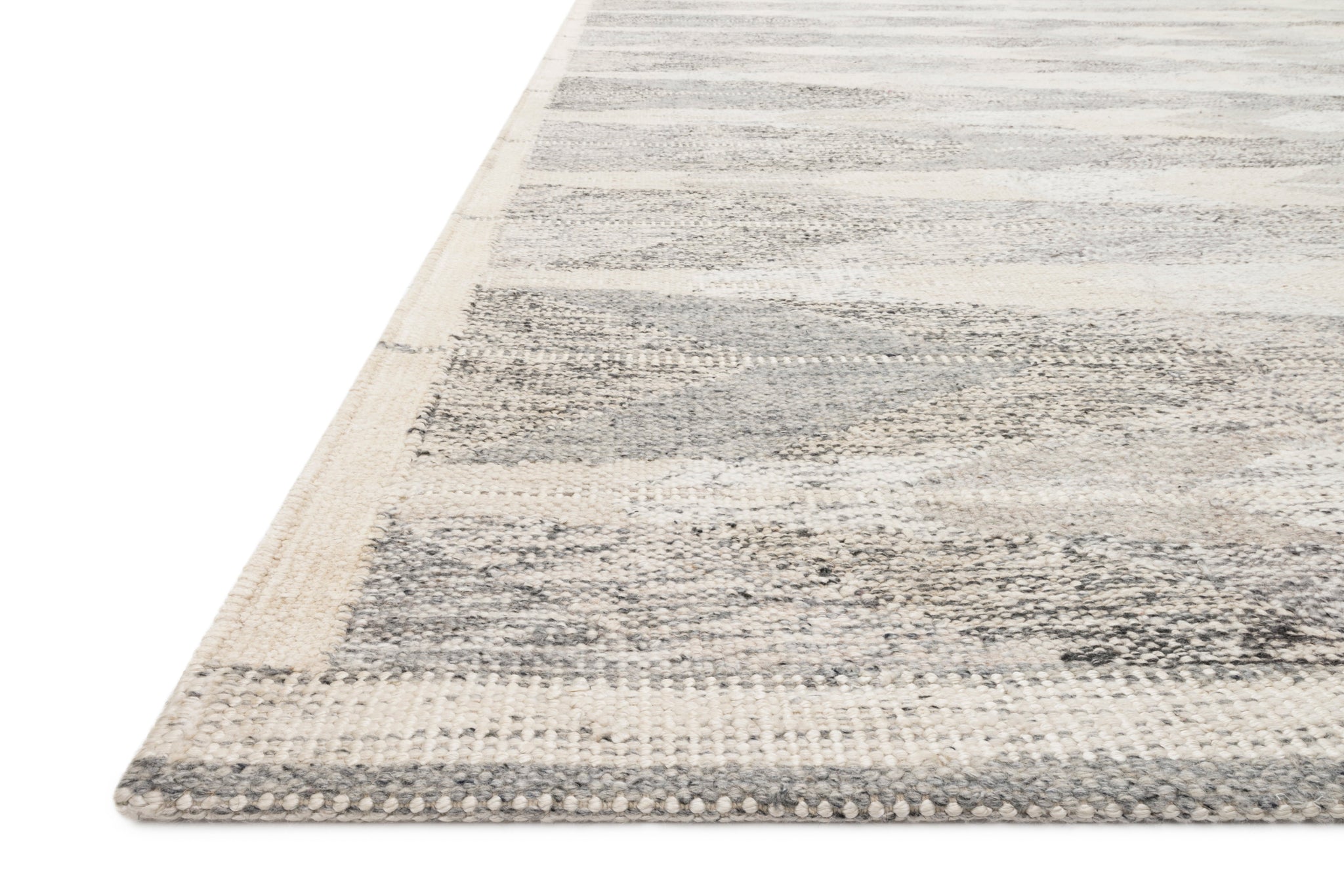 side view of Evelina Pewter / Silver luxury Rug