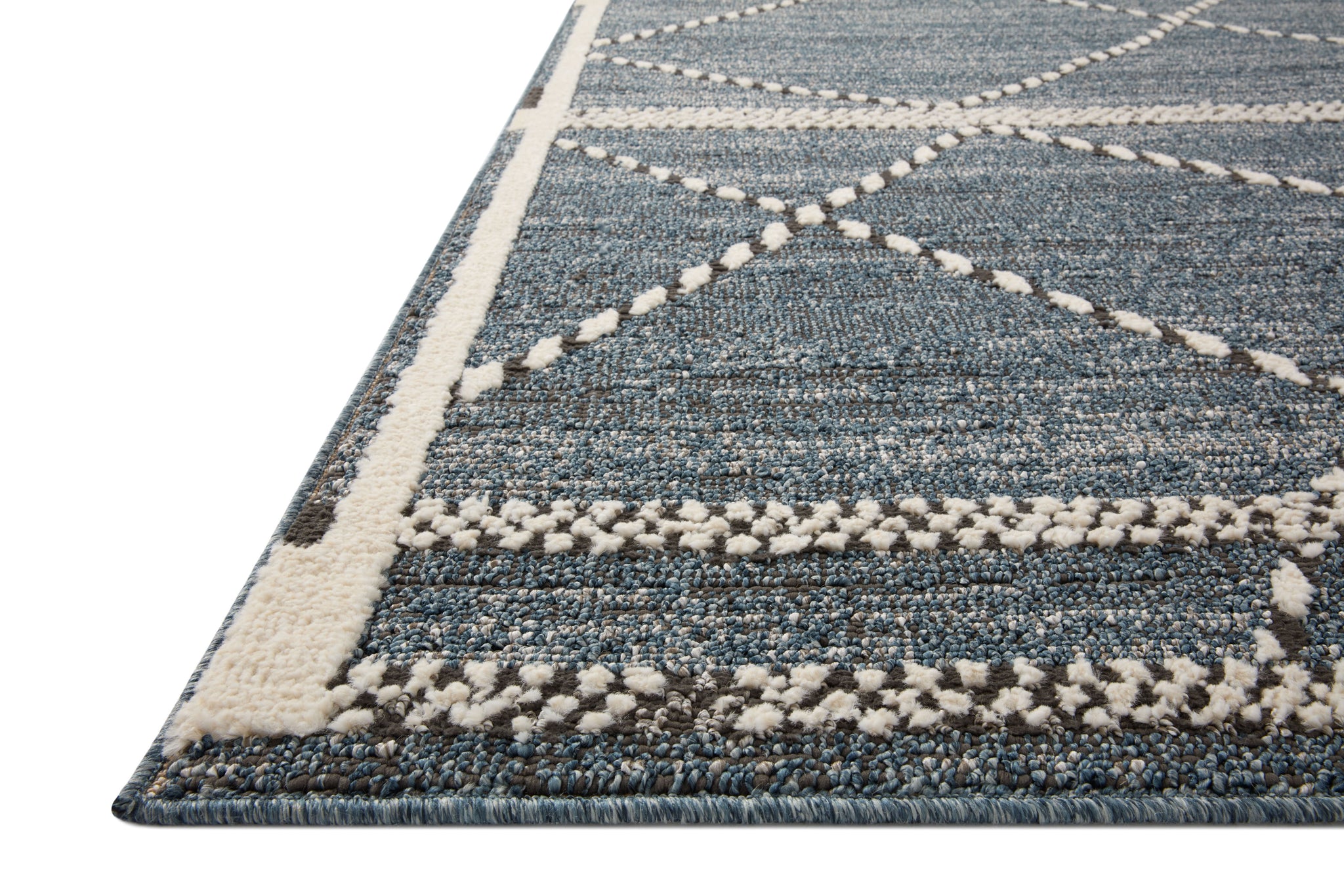 side view of Fabian Denim / Charcoal luxury Rug