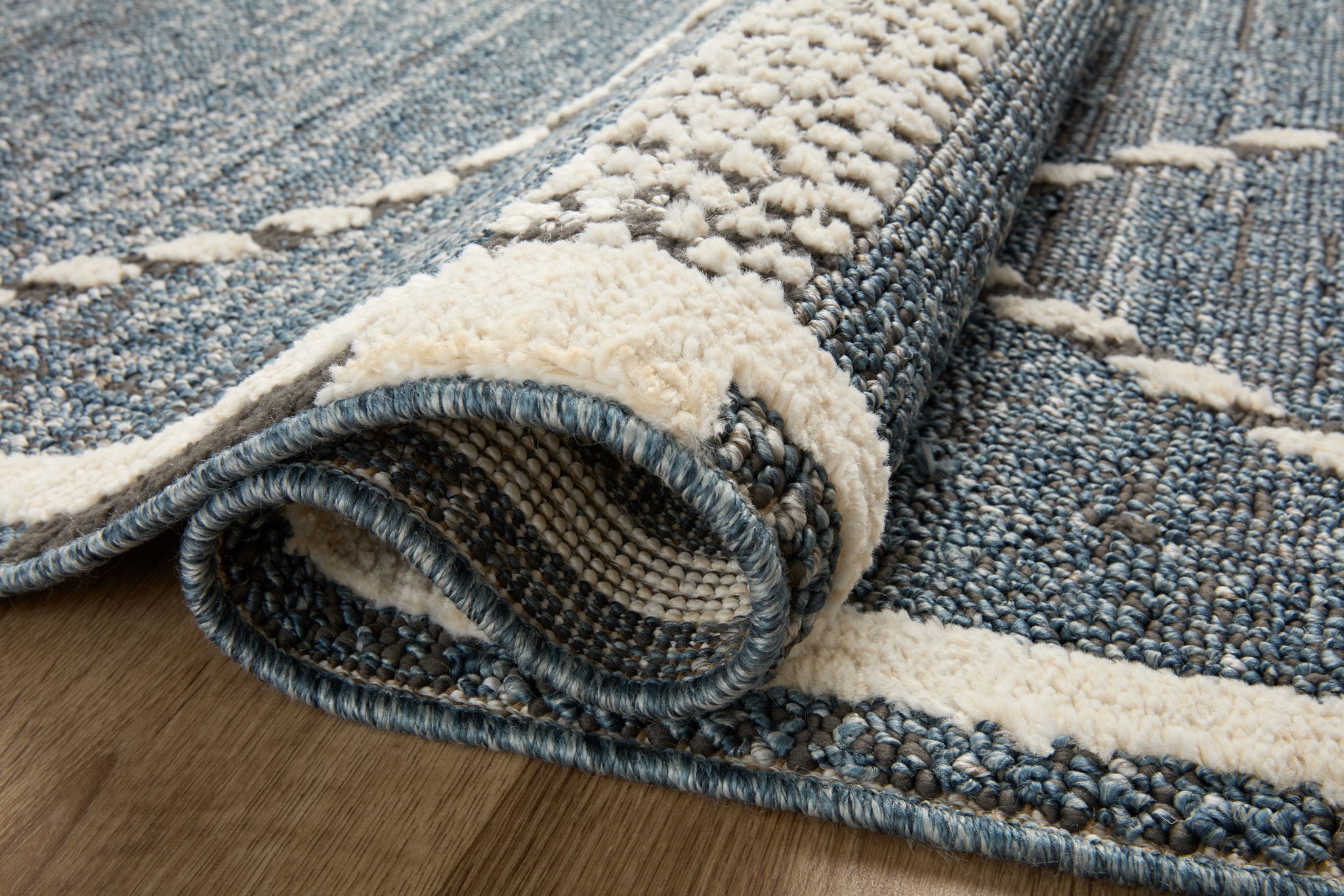 detail view of Fabian Denim / Charcoal luxury Rug