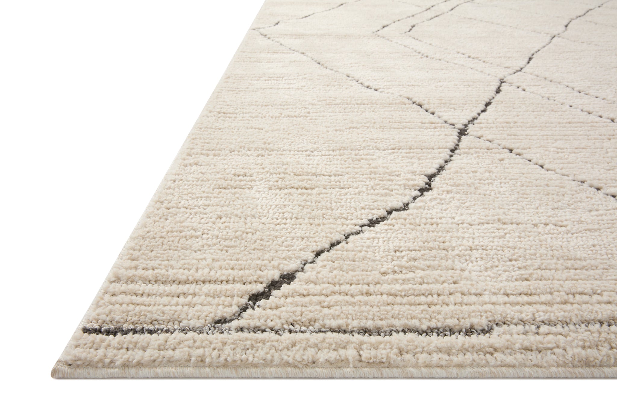 side view of Fabian Ivory / Charcoal luxury Rug